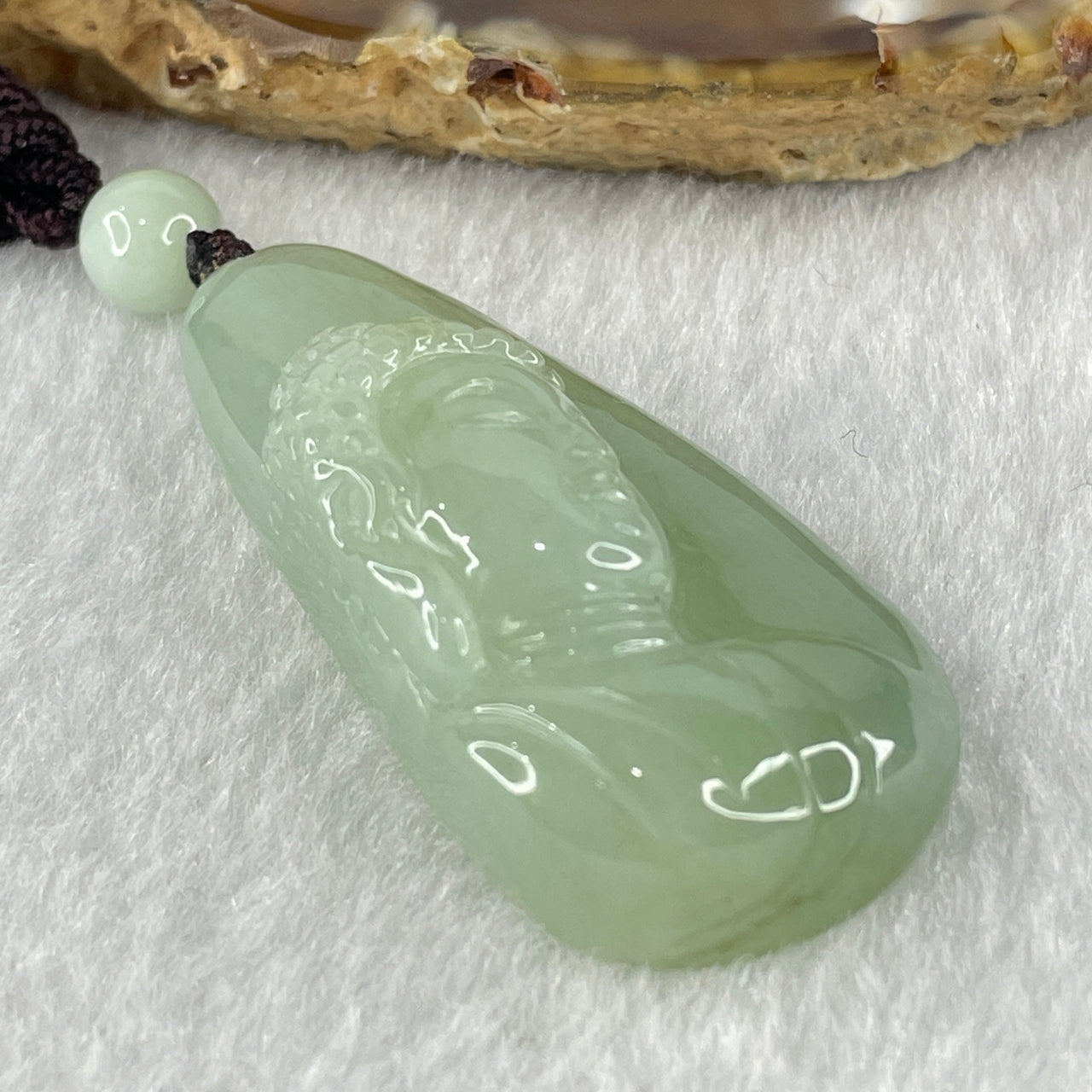 Natural Type A Light Green Jadeite Buddha Pendant 18.54g 43.2 by 22.5 by 11.8mm