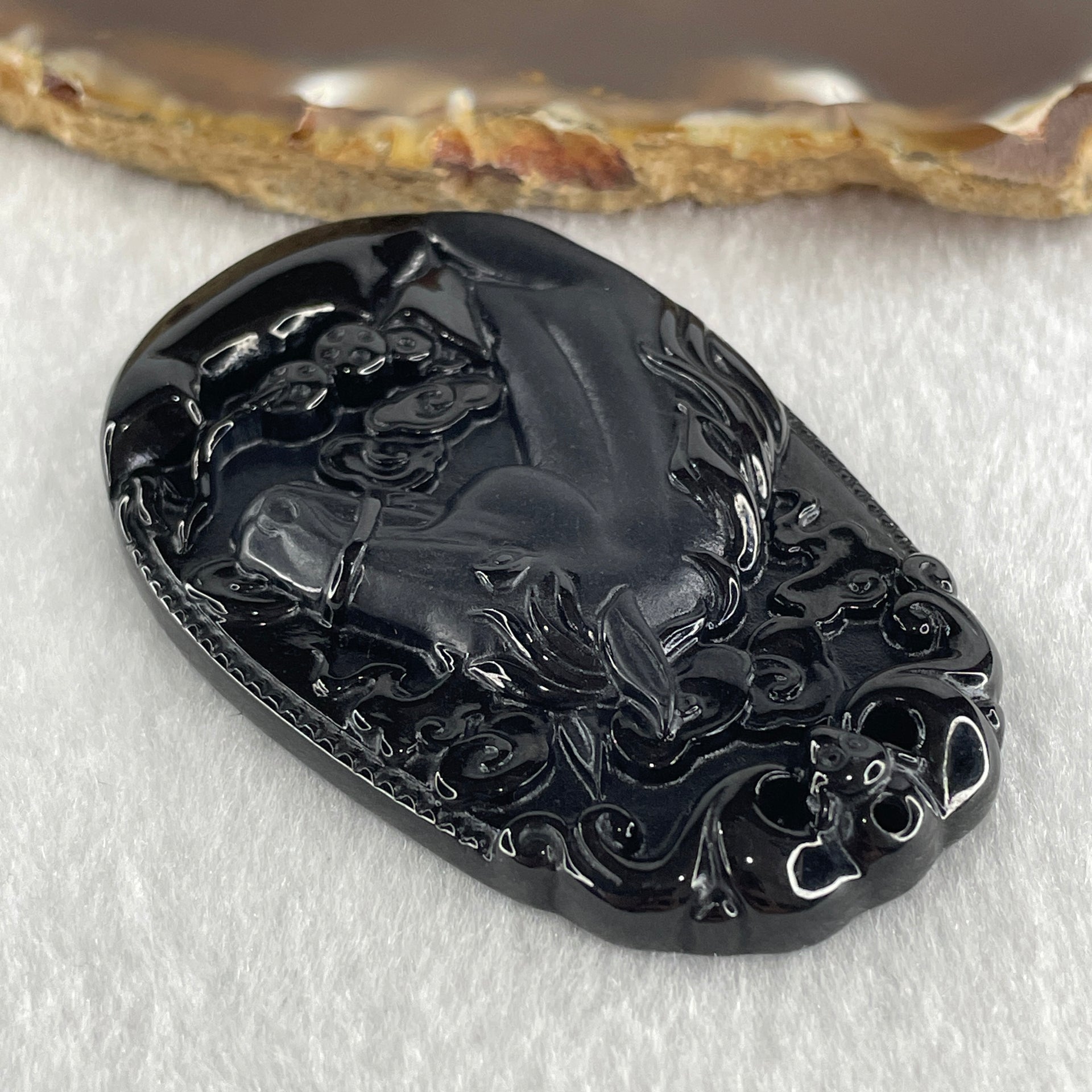Type A Opaque to Partial Translucent Black Omphacite Jadeite Horse Pendant 23.64g 60.1 by 40.1 by 8.4mm - Huangs Jadeite and Jewelry Pte Ltd