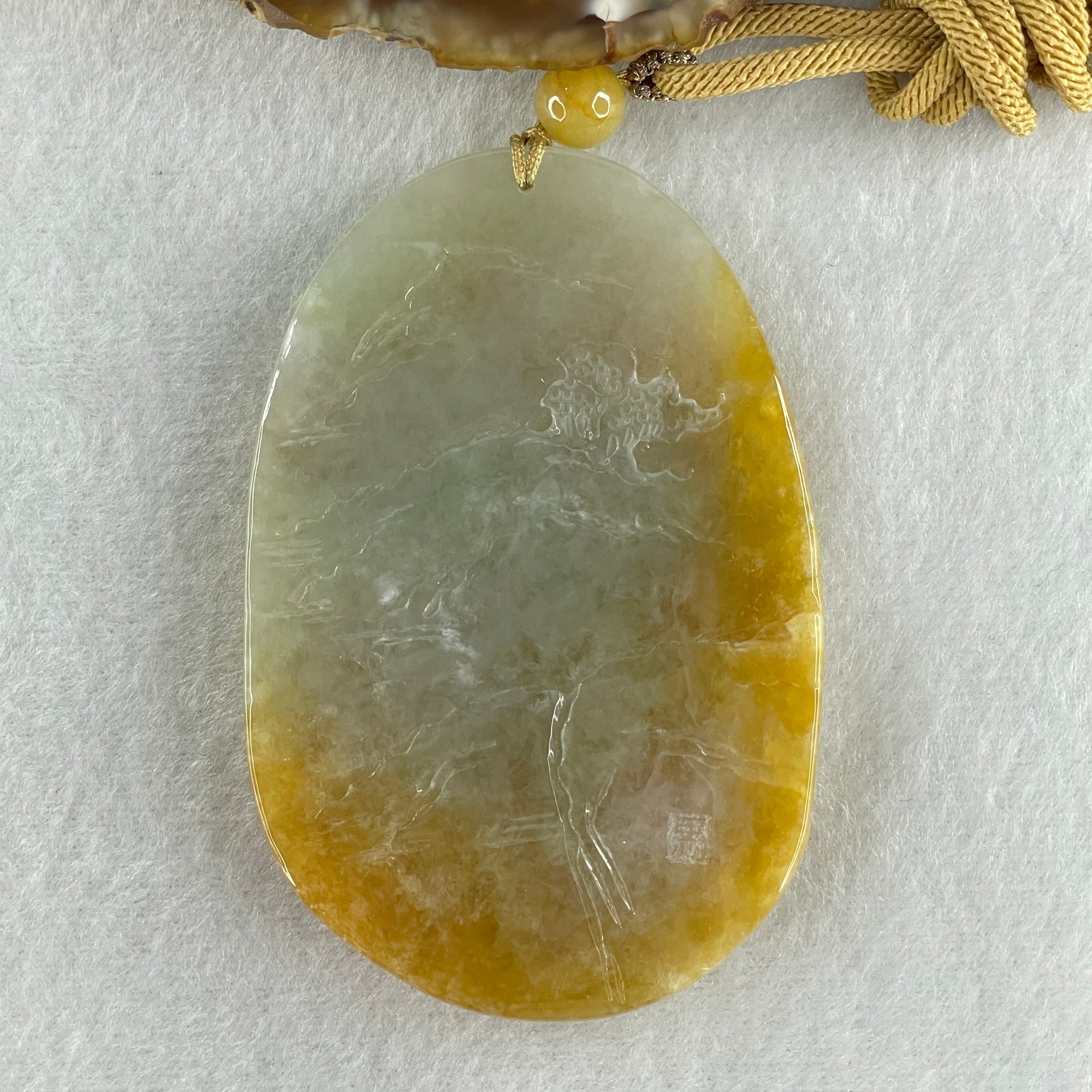 Grand Master Type A Yellowish with Light Green Patches Jadeite Cai Shen Ye God Of Fortune on Shan Shui with Gui Ren Pendant 75.70g 77.0 by 51.1 by 10.0mm - Huangs Jadeite and Jewelry Pte Ltd