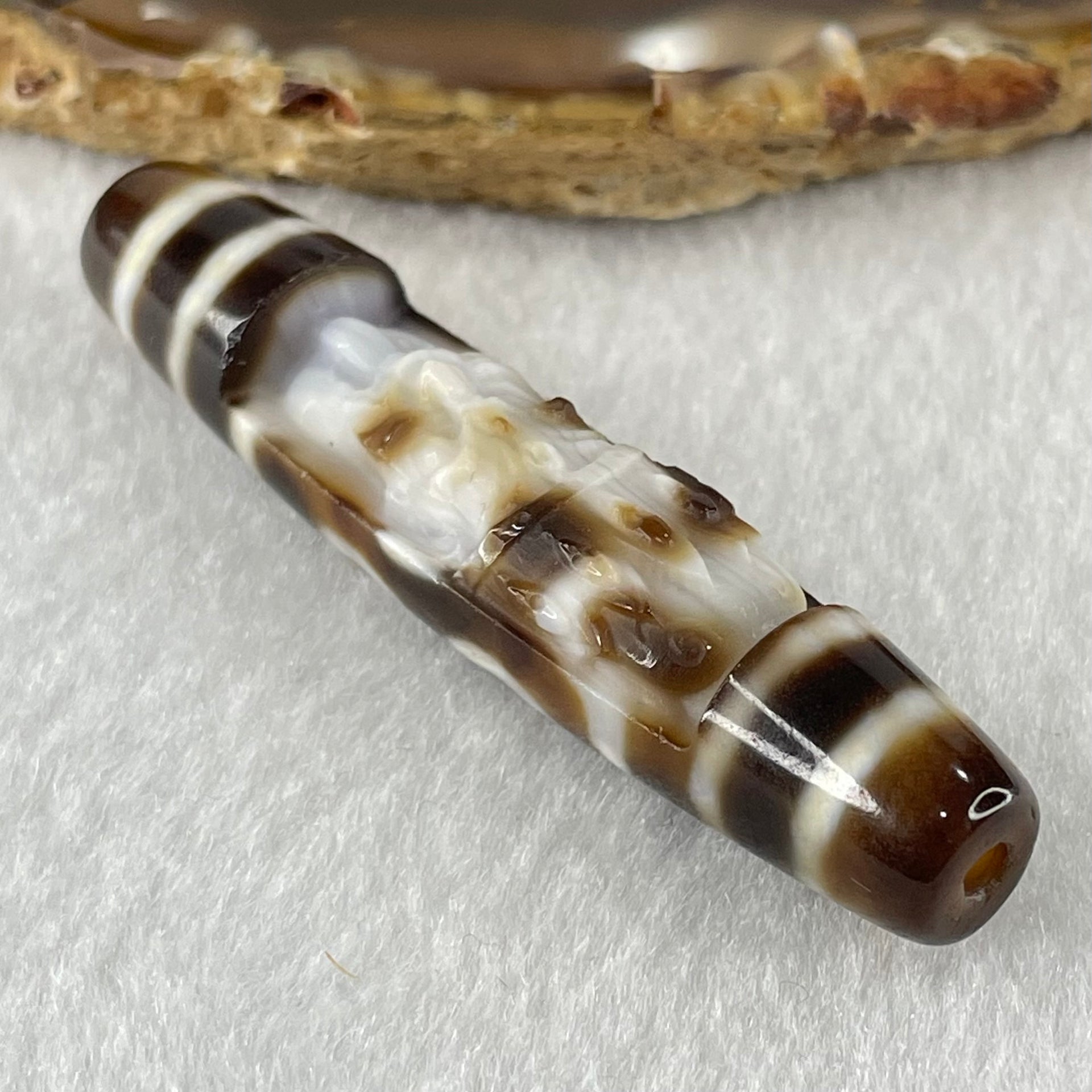 Natural Powerful Tibetan Old Oily Agate Zha Ji La Mu Female Cai Shen and 6 Eyes Dzi Bead Heavenly Master (Tian Zhu) 扎基拉姆女财神六眼天珠 13.32g 58.0 by 13.1mm - Huangs Jadeite and Jewelry Pte Ltd