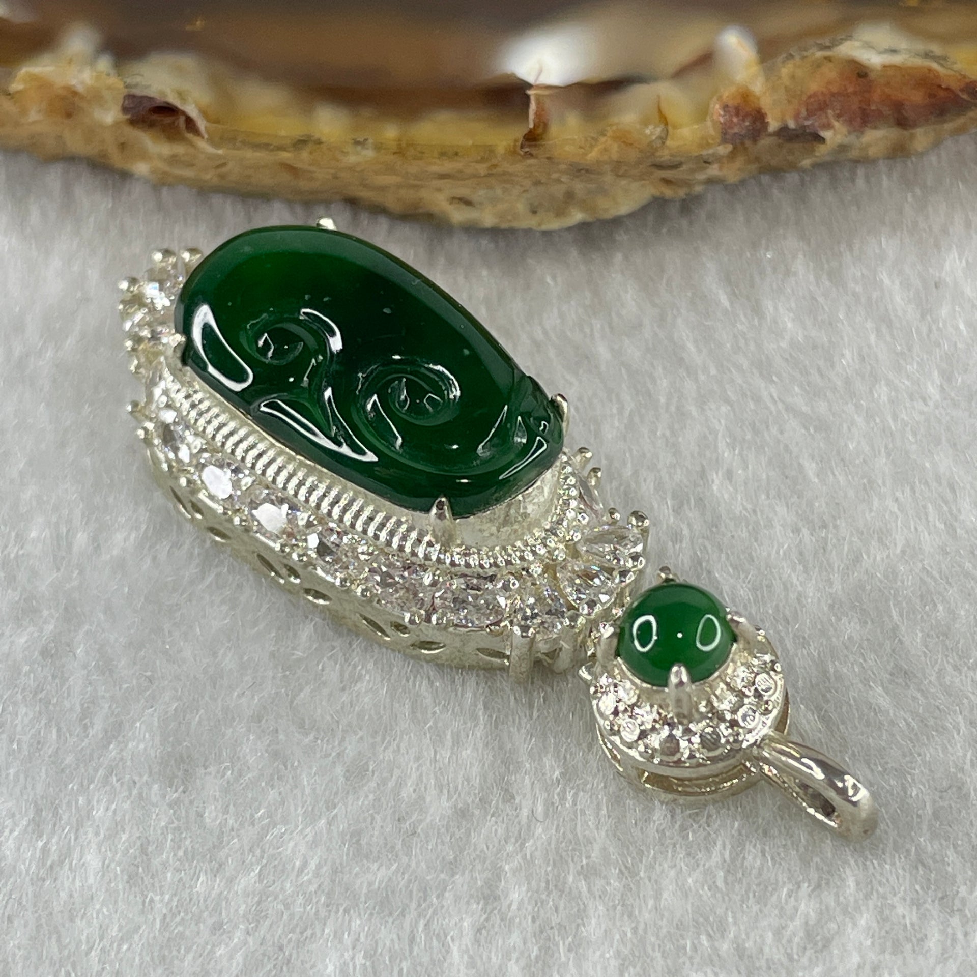 Type A Natural Semi Icy Bright Green Jadeite Ruyi Stone for Setting 19.0 by 10.8 by 2.5mm (On Silver Pendant Mold) 6.75g - Huangs Jadeite and Jewelry Pte Ltd