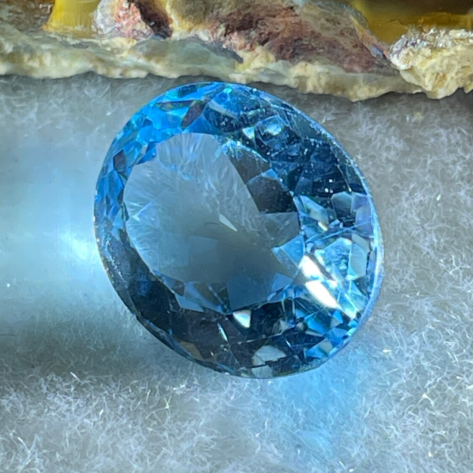 Natural Sky Blue Topaz Oval Shape 12.31ct 14.8 by 12.0 by 8.1mm - Huangs Jadeite and Jewelry Pte Ltd