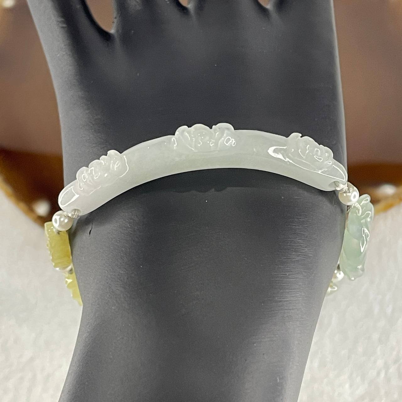 Natural Type A Semi Icy Light Green with Light Lavender Jadeite Flower Bracelet 16.97g 18cm 5.9 by 9.1mm - 22.6 by 14.1 by 5.5mm