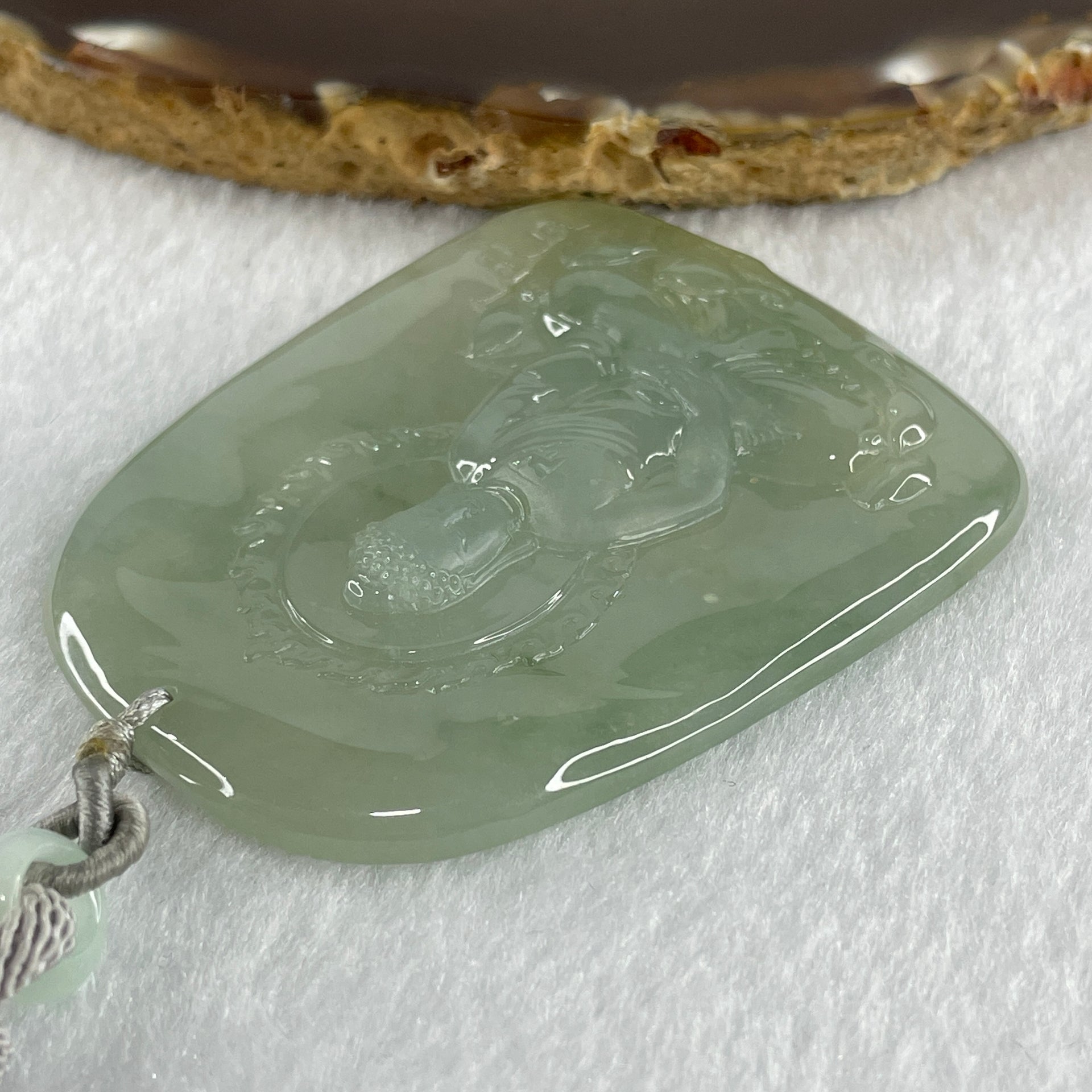 Type A Icy Light Green Jadeite Buddha Pendant 34.74g 61.3 by 48.3 by 5.5mm - Huangs Jadeite and Jewelry Pte Ltd