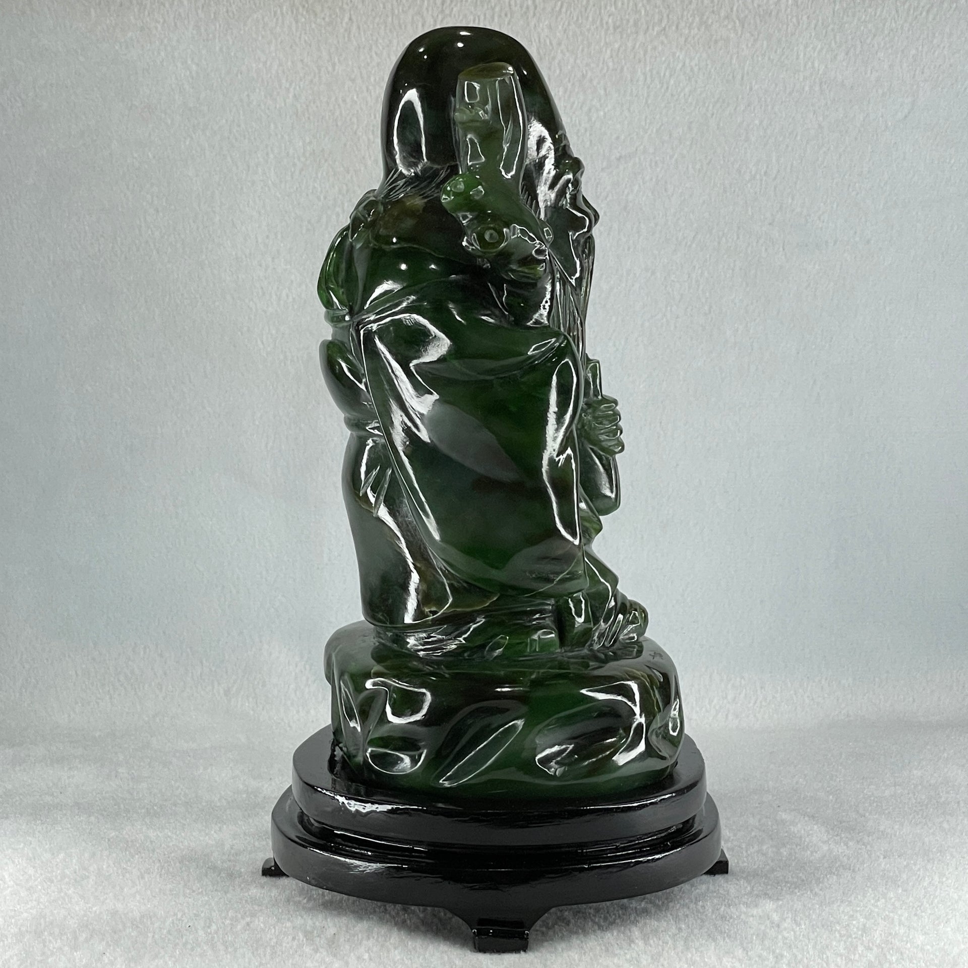 Natural Dark Green Serpentine Shou Xing Gong with Wooden Stand Display 2,374.7g 140.0 by 228.0 by 125.0mm - Huangs Jadeite and Jewelry Pte Ltd