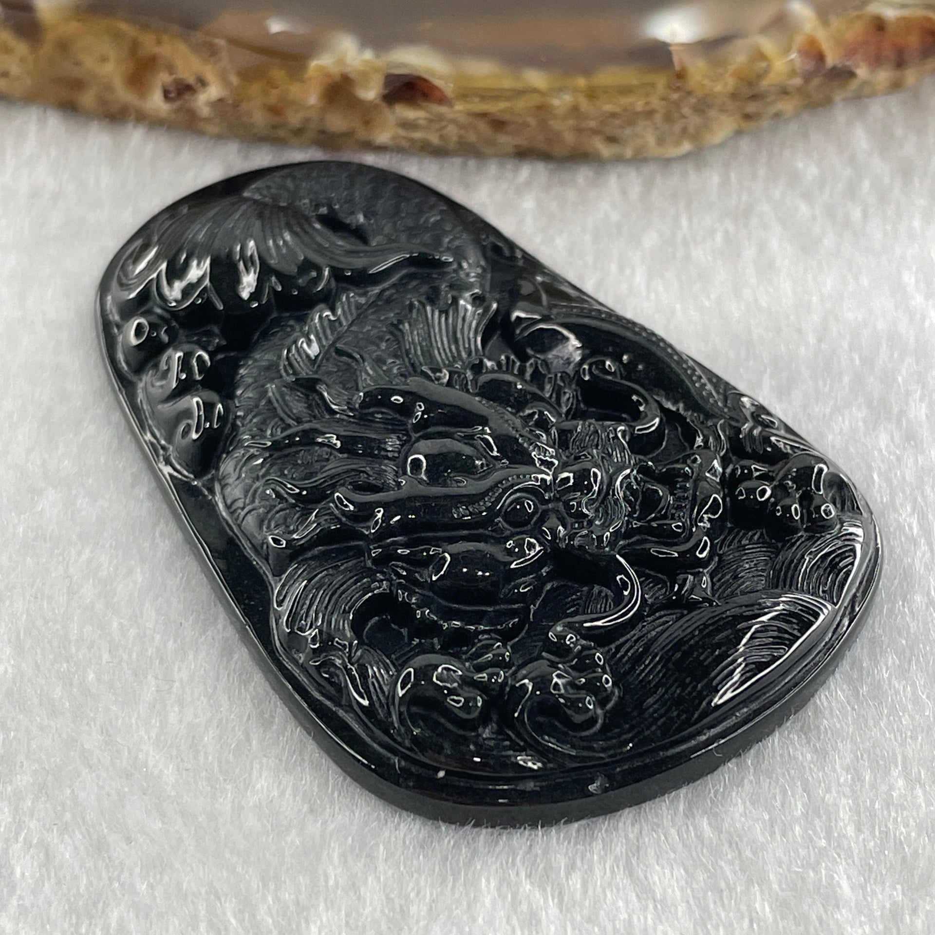 Type A Opaque to Partial Translucent Black Omphacite Jadeite Dragon Carp Pendant 20.39g 57.5 by 36.6 by 7.5mm - Huangs Jadeite and Jewelry Pte Ltd