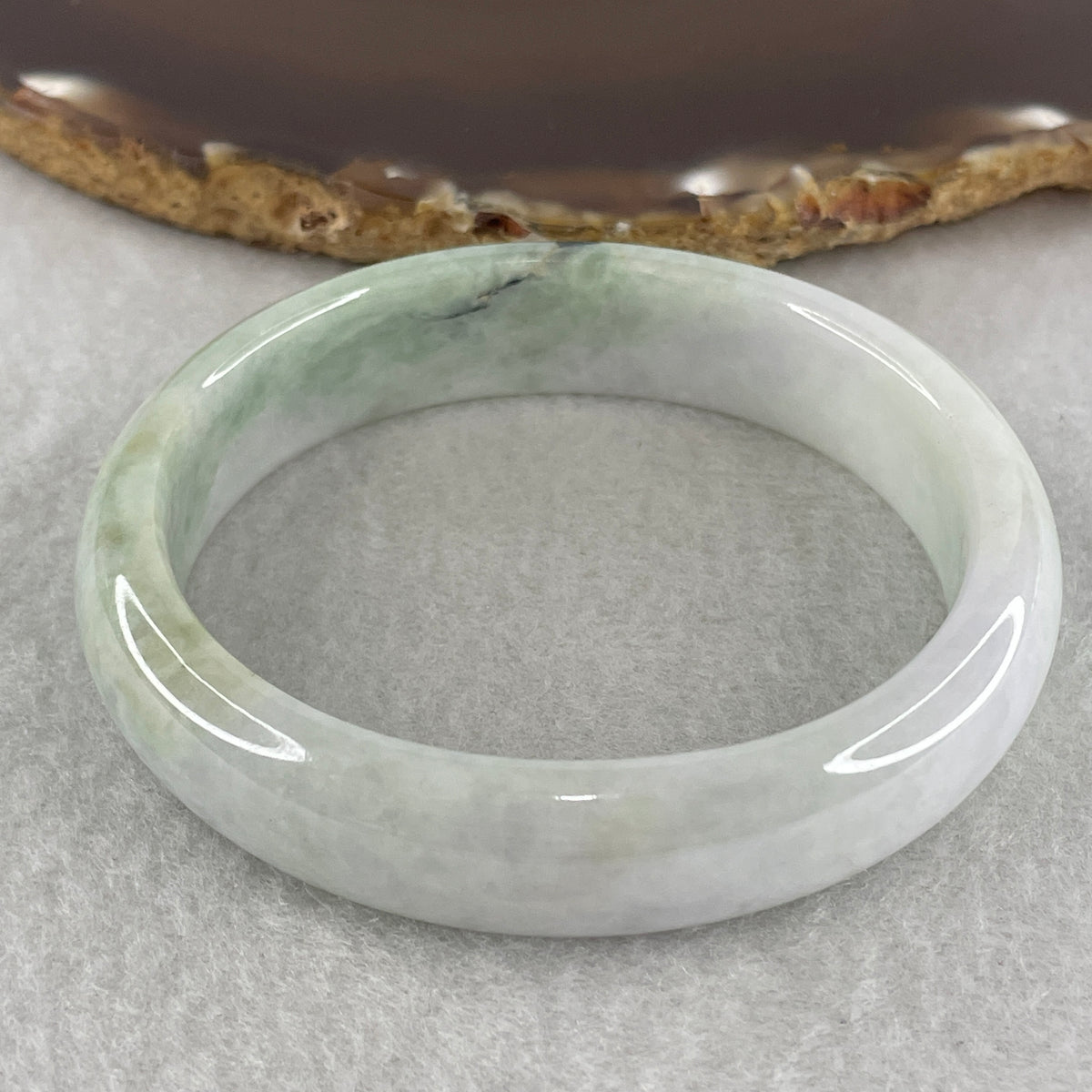 Natural Type A Light Lavender with Green Jadeite Oval Bangle 50.92g Inner Diameter 57.2mm 14.3 by 7.2mm (Slight External Rough) - Huangs Jadeite and Jewelry Pte Ltd