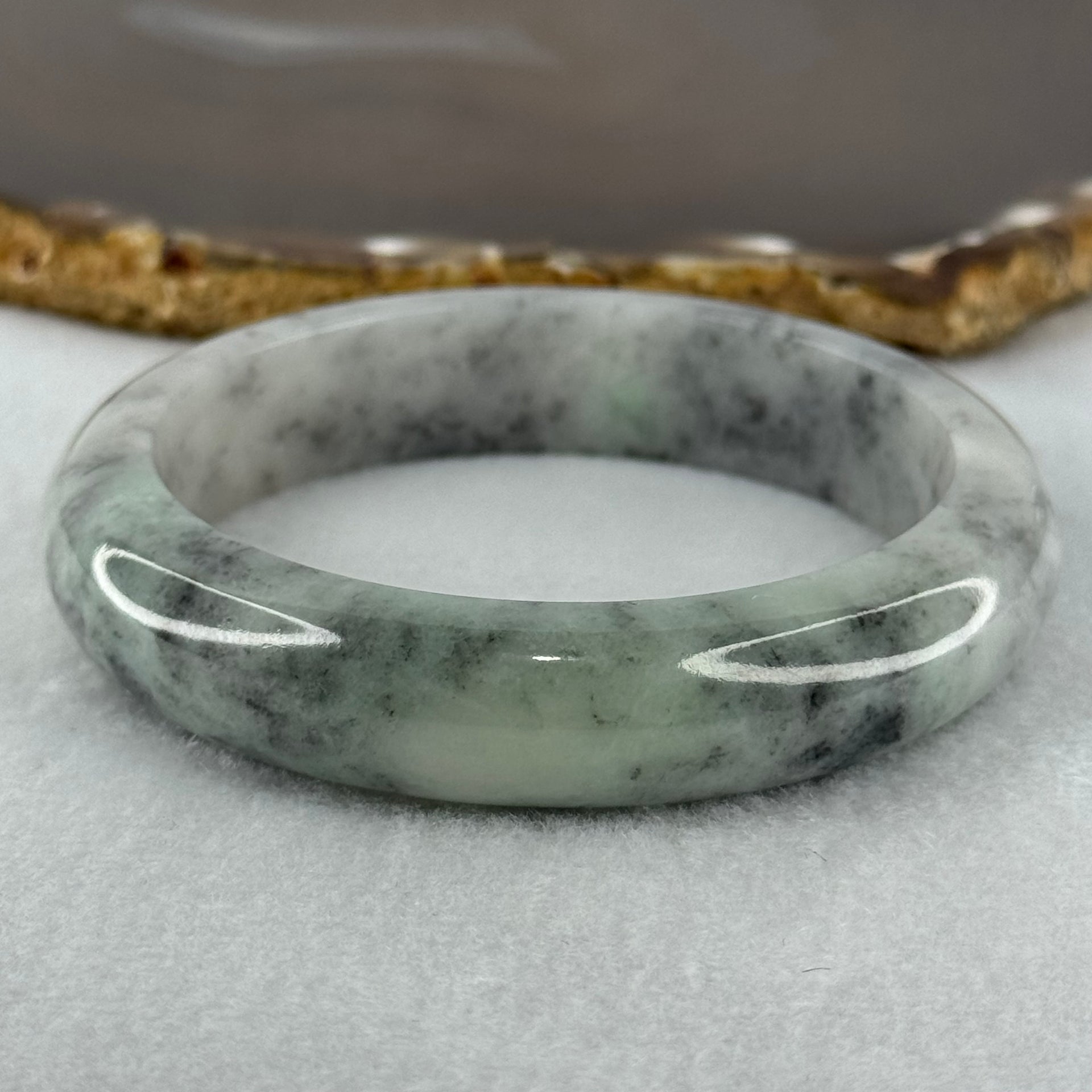 Type A Faint Green and Black Piao Hua Jadeite Bangle Internal Diameter 57.2mm 65.08g 13.4 by 8.7mm (Very Slight Internal Lines) - Huangs Jadeite and Jewelry Pte Ltd