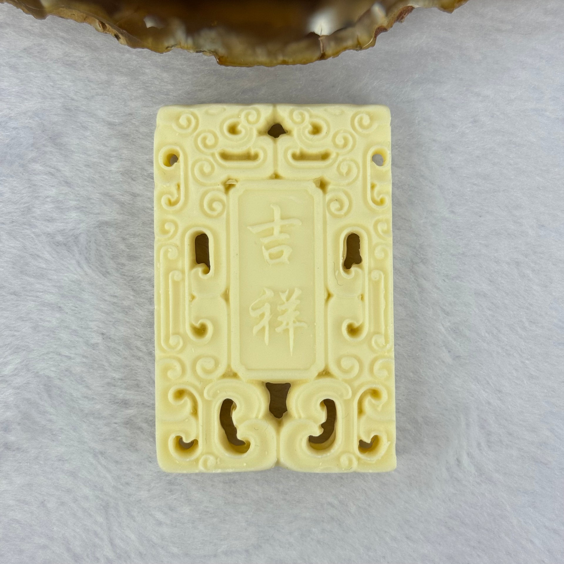 Ivory Fruit Seed Tagua Nut Pendent 象牙果粉雕刻常胜将军吊坠挂项链 28.56g 59.1 by 37.8 by 9.9mm - Huangs Jadeite and Jewelry Pte Ltd
