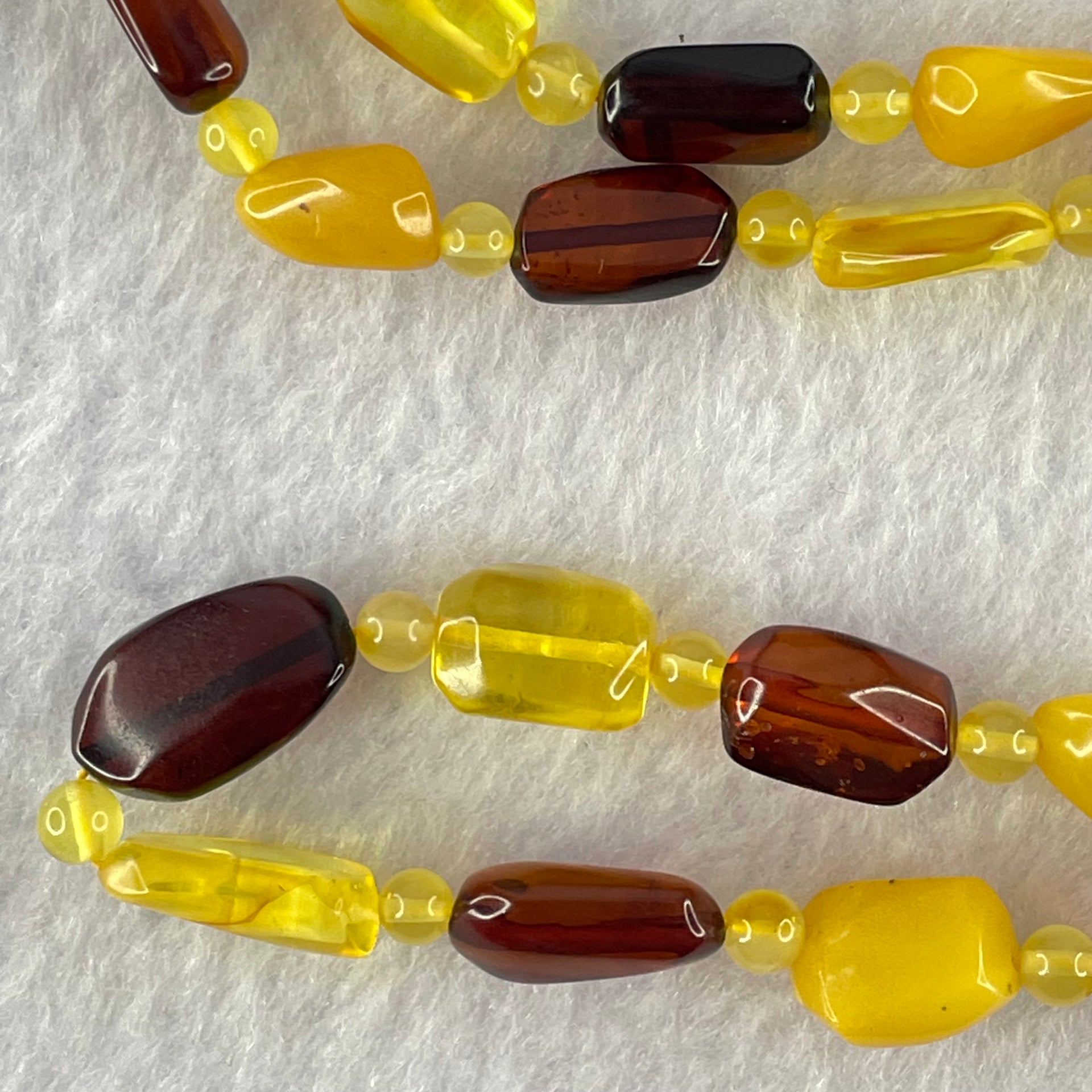 Natural Mixed Color Amber Beads Necklaces 15.42g 62cm 16.0 by 9.9 by 5.2mm, 9.9 by 7.2 by 4.6mm 39 Odd shape pieces - Huangs Jadeite and Jewelry Pte Ltd