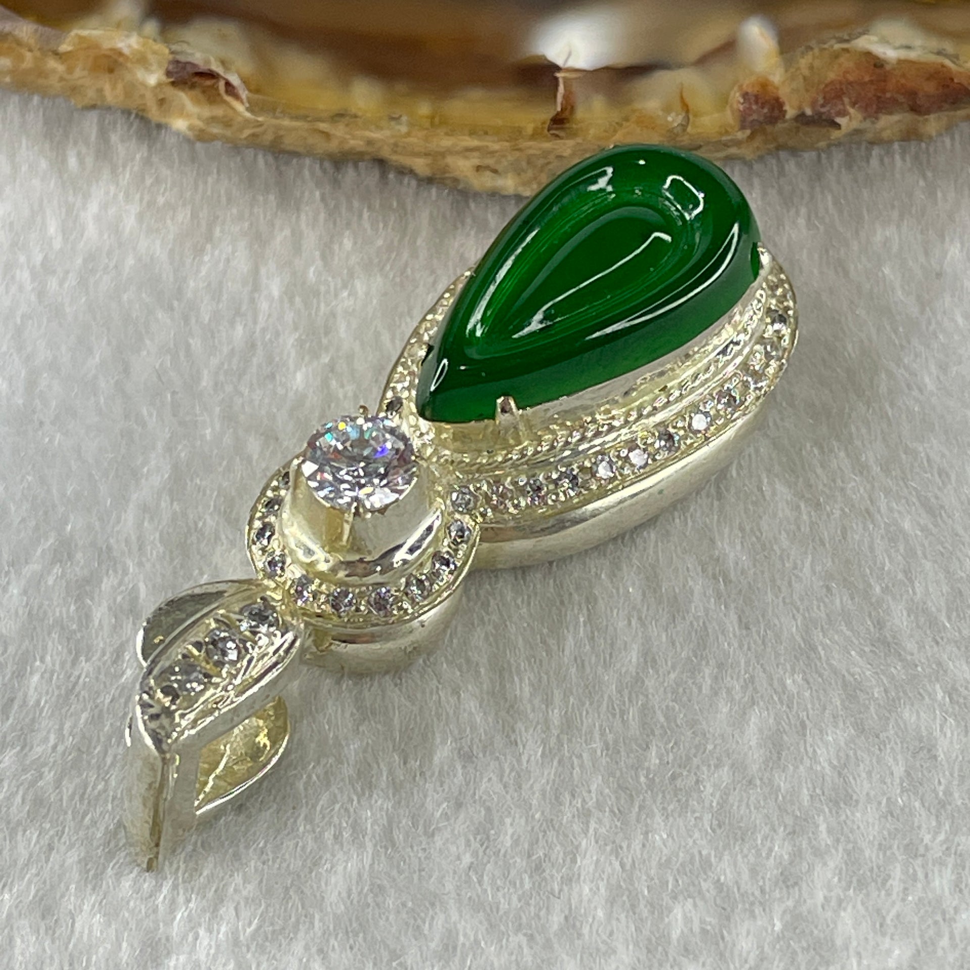 Type A Natural Semi Icy Bright Green Jadeite Tear Drop Shape Stone for Setting 18.1 by 10.5 by 3.0mm (On Silver Pendant Mold) 15.22g - Huangs Jadeite and Jewelry Pte Ltd