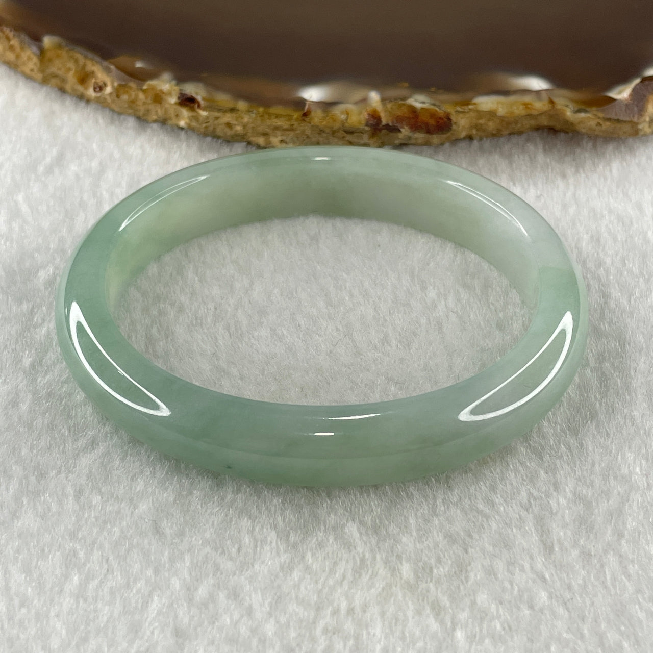 Natural Type A Jelly Full Light Green Jadeite Oval Bangle 34.07g Inner Diameter 53.8mm 10.2 by 7.4mm (Very Slight Internal Lines) - Huangs Jadeite and Jewelry Pte Ltd