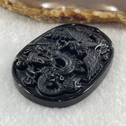 Type A Opaque to Partial Translucent Black Omphacite Jadeite Dragon and Phoenix Pendant 20.96g 50.2 by 38.3 by 8.4mm - Huangs Jadeite and Jewelry Pte Ltd