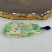 Type A Natural Light Green with Apple Green Jadeite 3D Dragon In Hollow Carving Pendant 27.58g 58.65 by 39.42 by 8.48mm with NGI Cert No. 16824716 - Huangs Jadeite and Jewelry Pte Ltd