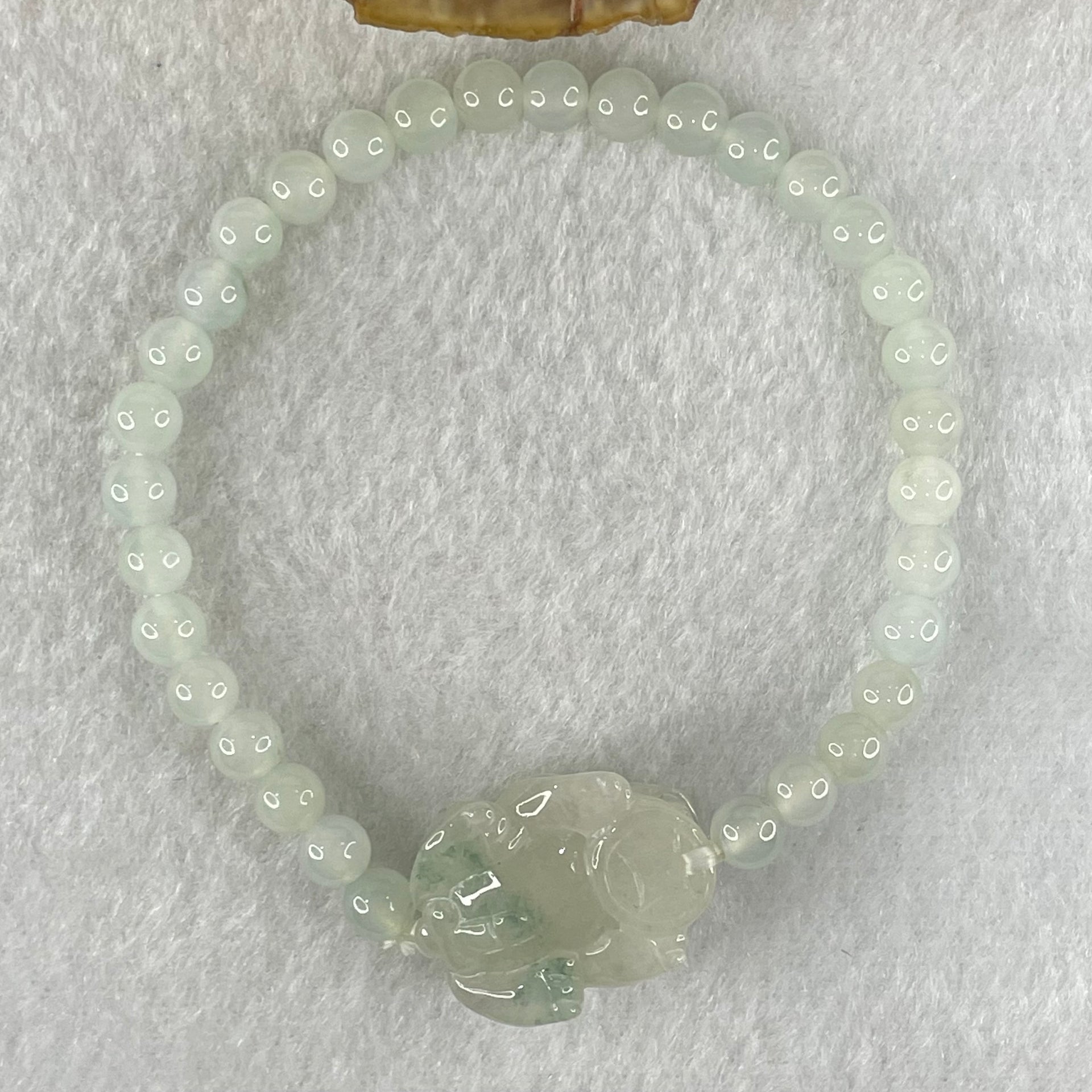 Special Type A Semi Icy Light Blueish Green Jadeite with Male Pixiu Charm Bracelet 5.61g 16cm 5.4mm 32 Beads 22.4 by 11.4 by 11.8mm 1pcs - Huangs Jadeite and Jewelry Pte Ltd