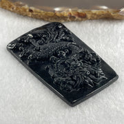 Type A Opaque to Partial Translucent Black Omphacite Jadeite Dragon Pendant 30.25g 64.4 by 42.8 by 8.2mm - Huangs Jadeite and Jewelry Pte Ltd