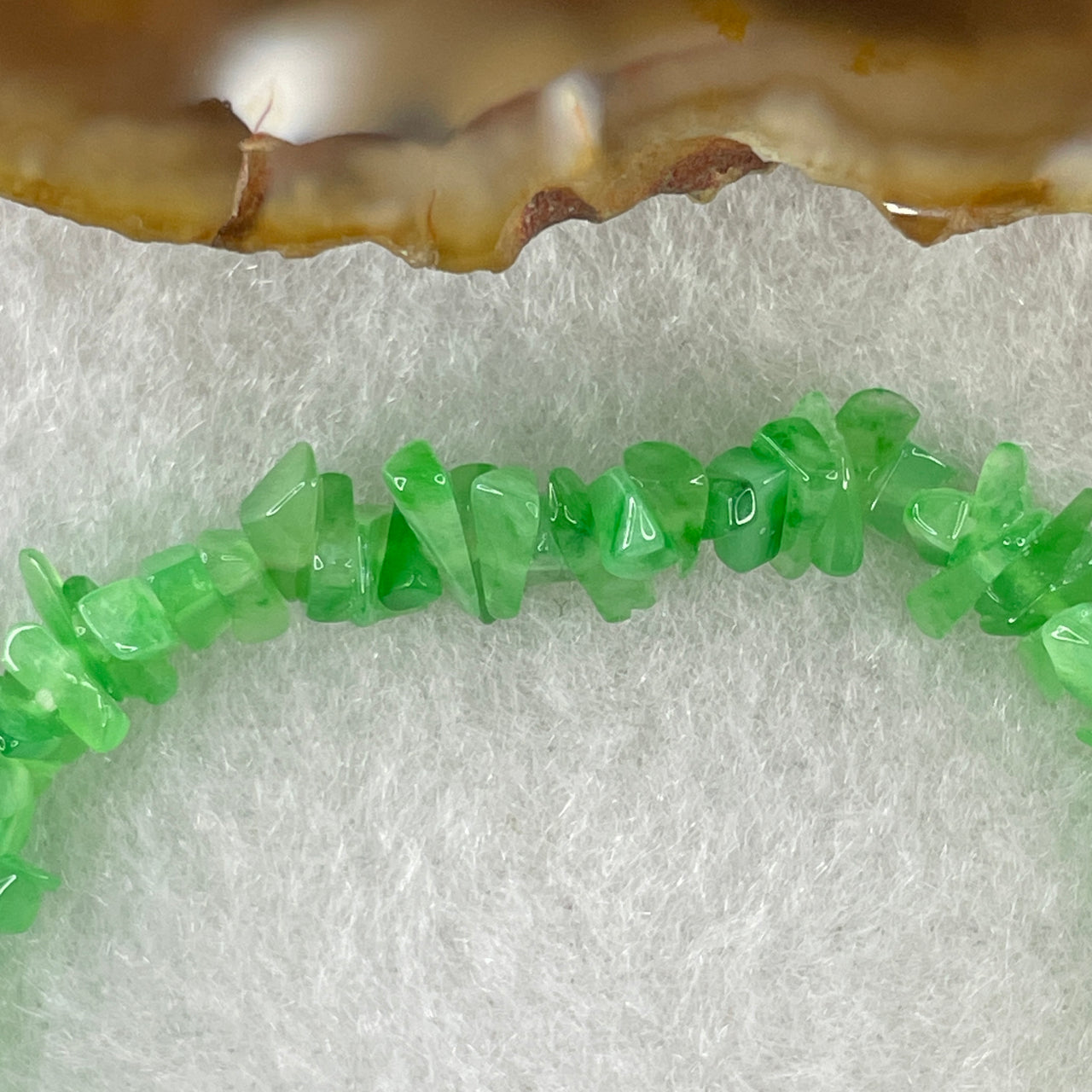 Type A Natural Semi Bright Green Jadeite Fragments Bracelet 5.53g 13cm 5.9mm About 110 pieces - Huangs Jadeite and Jewelry Pte Ltd