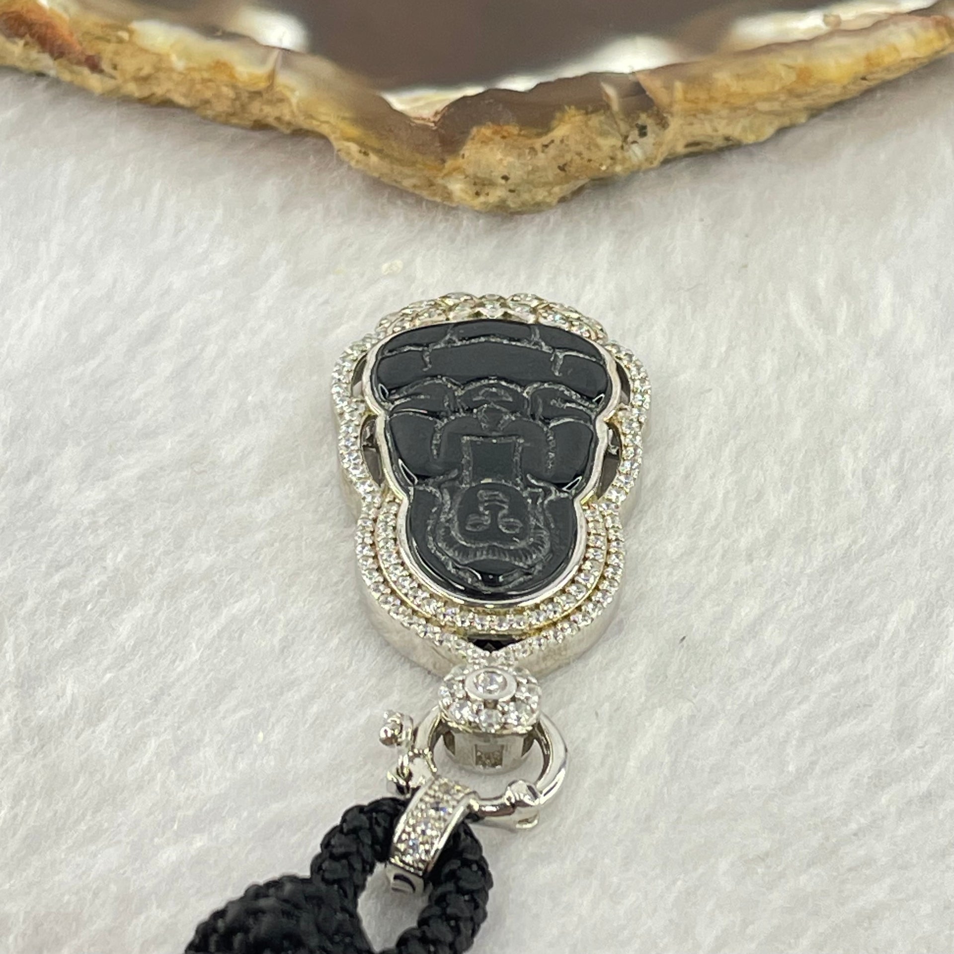 Type A Translucent Black Omphasite Jadeite Guan Yin 24.8 by 15.3 by 1.8mm Pendant in S925 Sliver Pendant 11.89g - Huangs Jadeite and Jewelry Pte Ltd