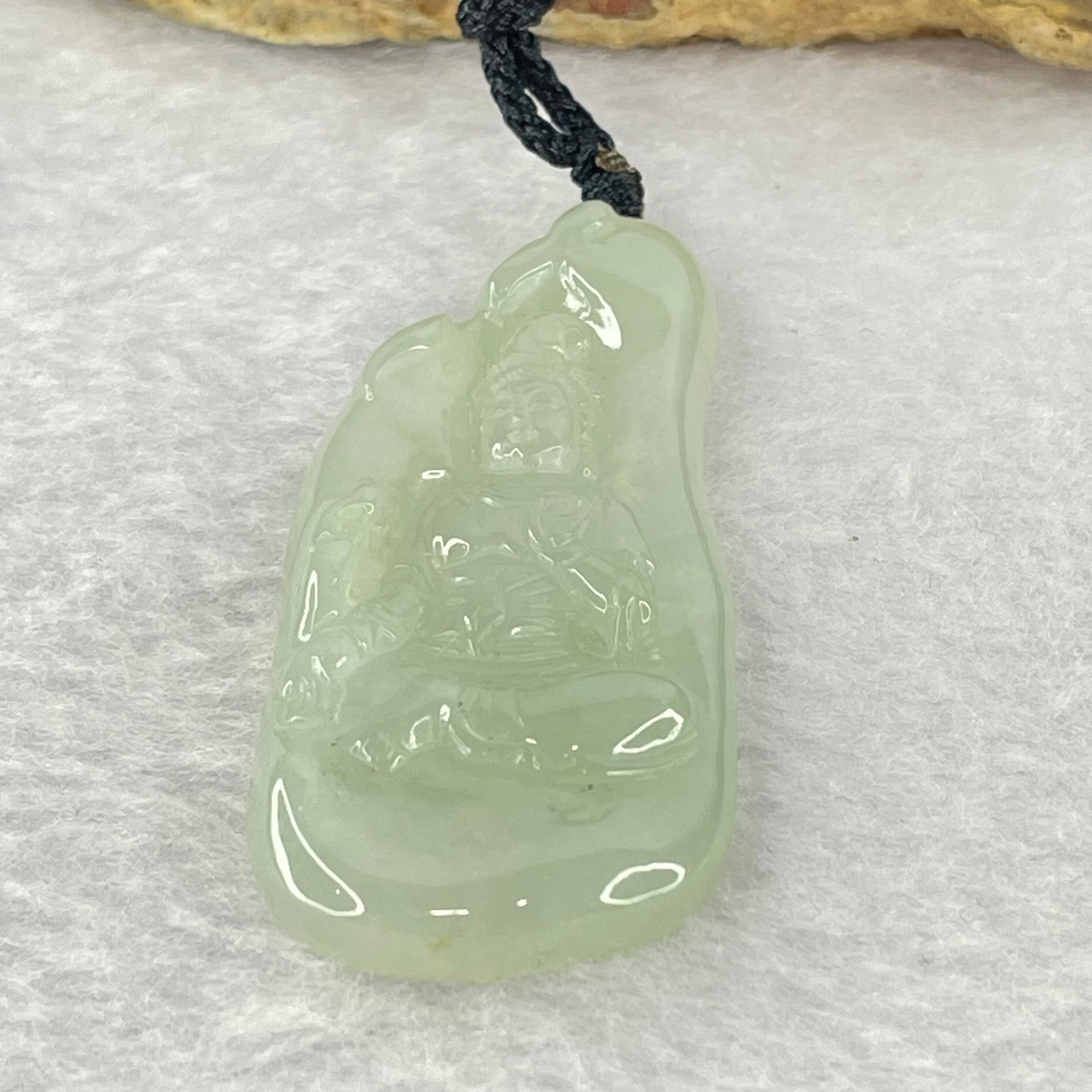 Type A Semi Icy Green Jadeite Guan Yin Pendent 11.98g 48.0 by 21.3 by 5.4mm - Huangs Jadeite and Jewelry Pte Ltd