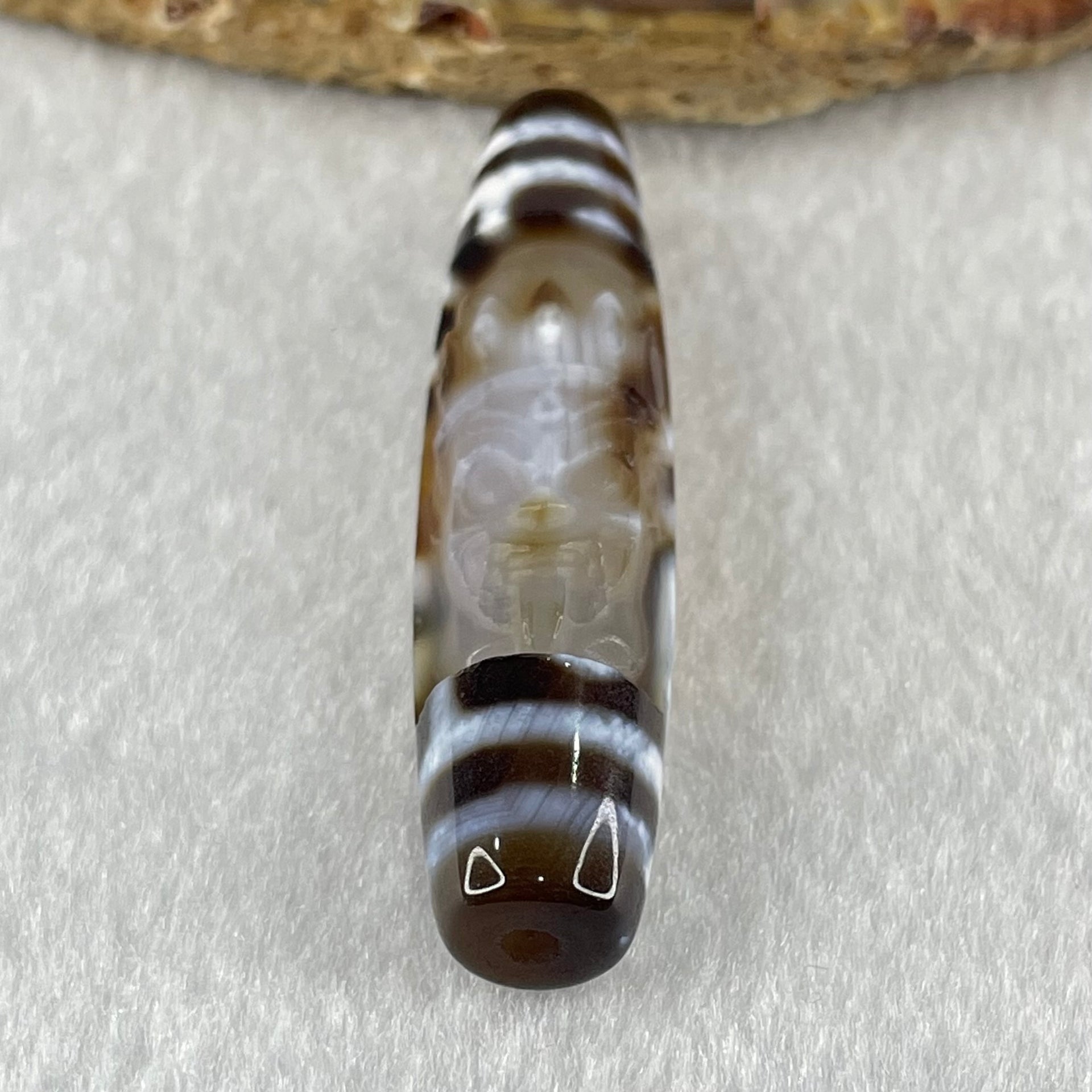 Natural Powerful Tibetan Old Oily Agate Zha Ji La Mu Female Cai Shen Carvings on 9 Eyes Dzi Bead Heavenly Master (Tian Zhu) 九眼扎基拉姆女财神天珠 14.46g 58.4 by 13.0mm - Huangs Jadeite and Jewelry Pte Ltd