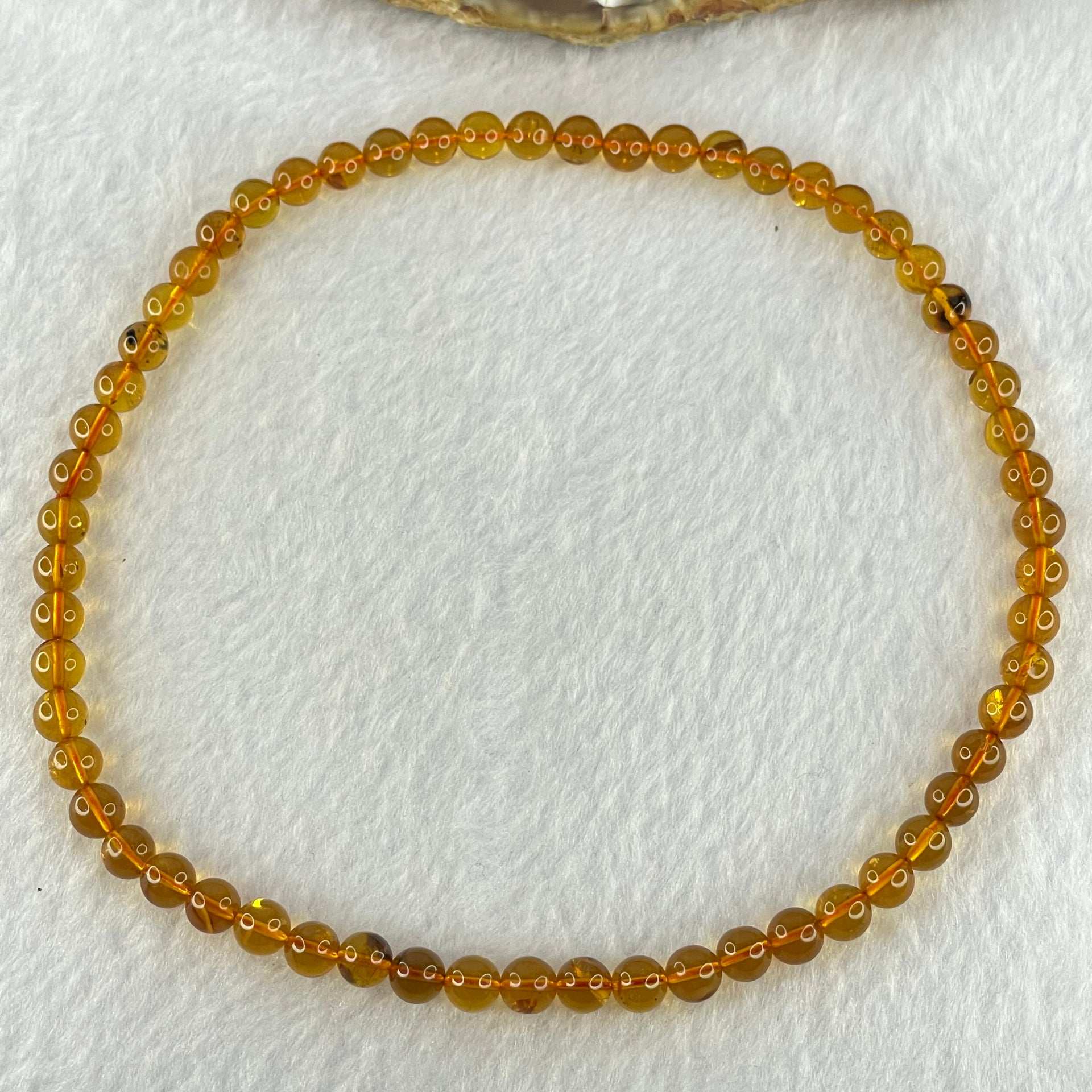 Natural Gold Yellow Amber Elastic Necklace 天然黄琥珀项链 9.24g 32cm 6.7mm 59 Beads - Huangs Jadeite and Jewelry Pte Ltd