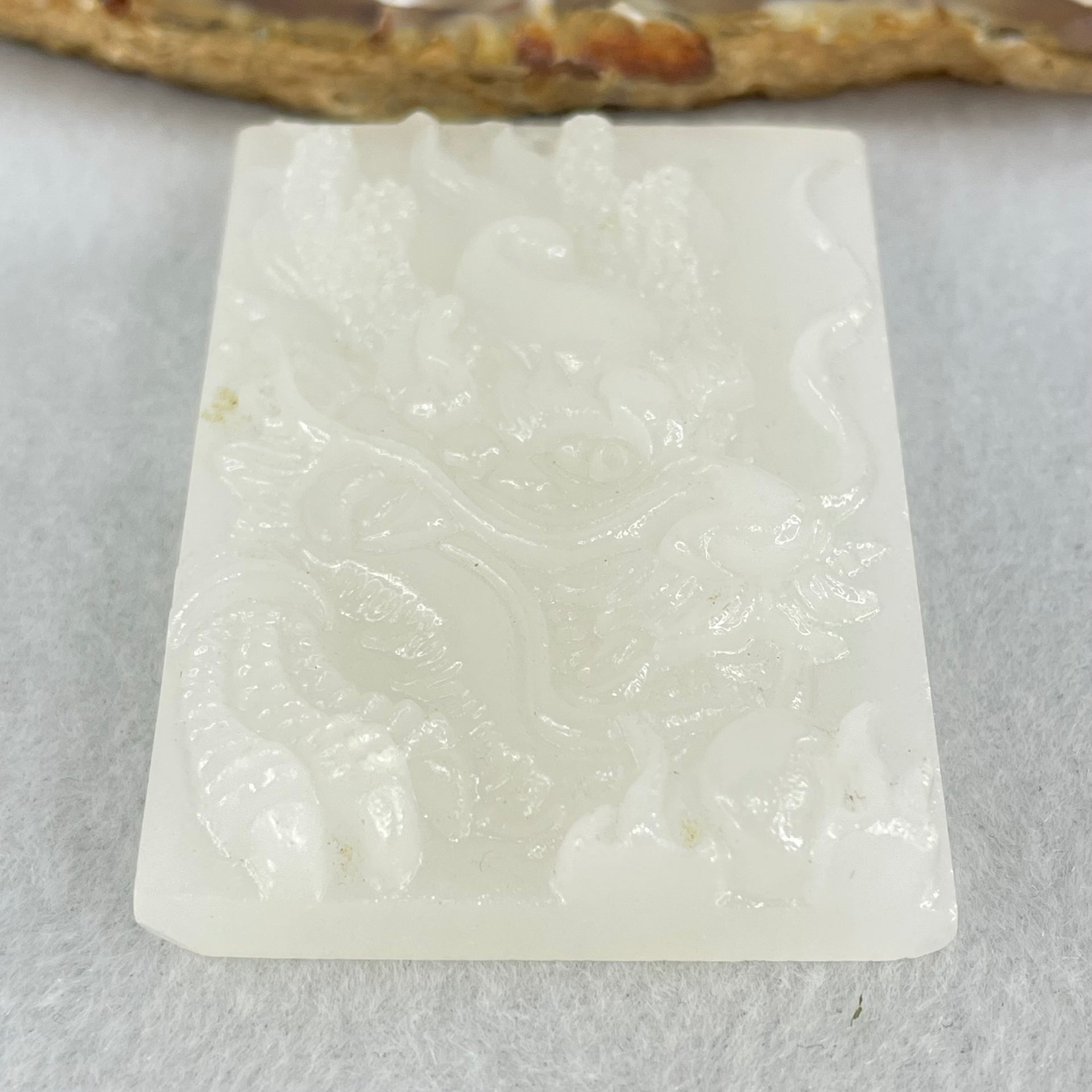 Natural White Nephrite Dragon Pendant 48.48g 57.4 by 39.5 by 11.4mm - Huangs Jadeite and Jewelry Pte Ltd