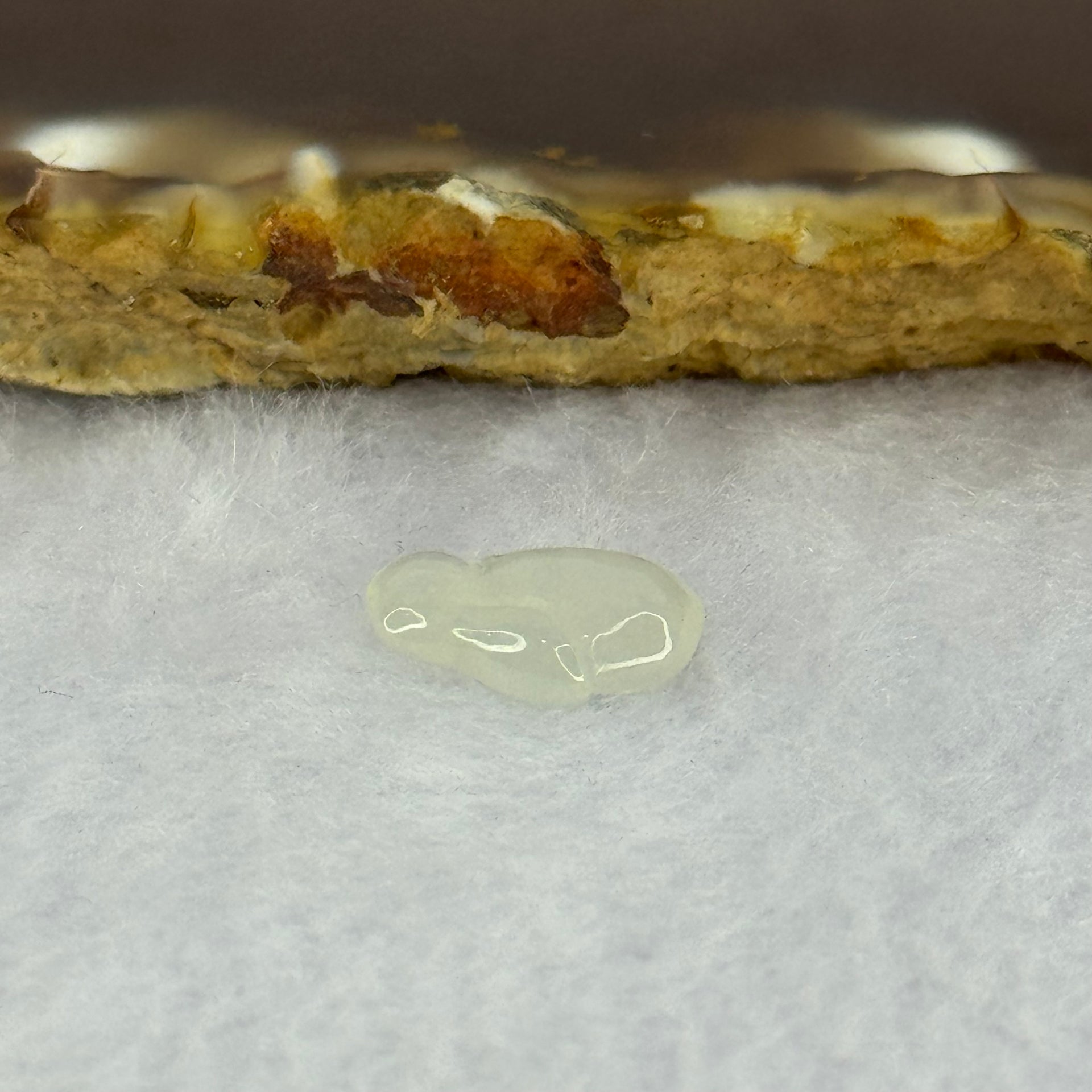 Type A Icy Faint Green Jadeite Rabbit Charm 0.55g 12.1 by 3.4 by 7.8mm - Huangs Jadeite and Jewelry Pte Ltd