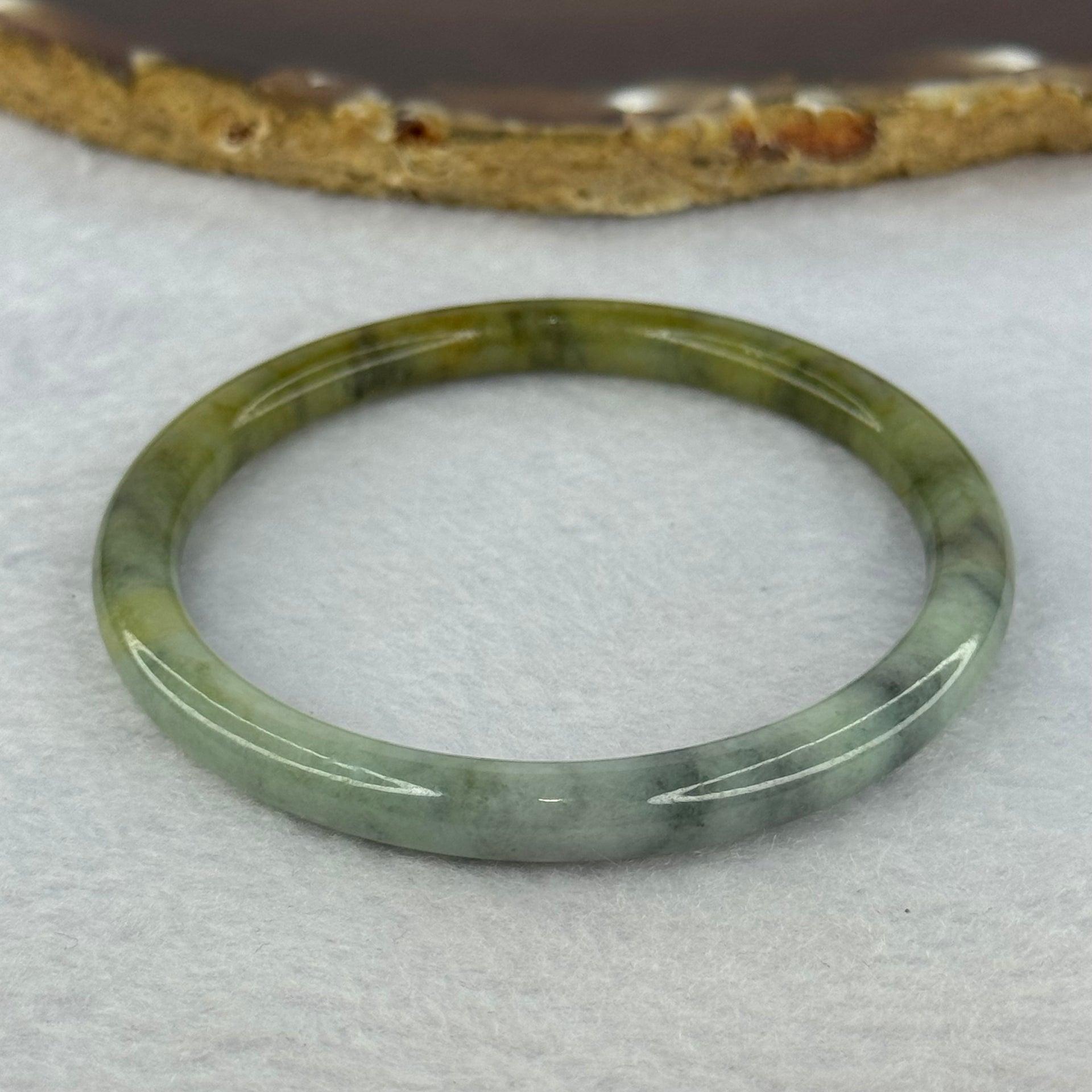Type A Brownish Green with Green Piao Hua Jadeite Bangle 19.16g Internal Diameter 53.5mm 6.5 by 6.7mm (Slight External Line) - Huangs Jadeite and Jewelry Pte Ltd