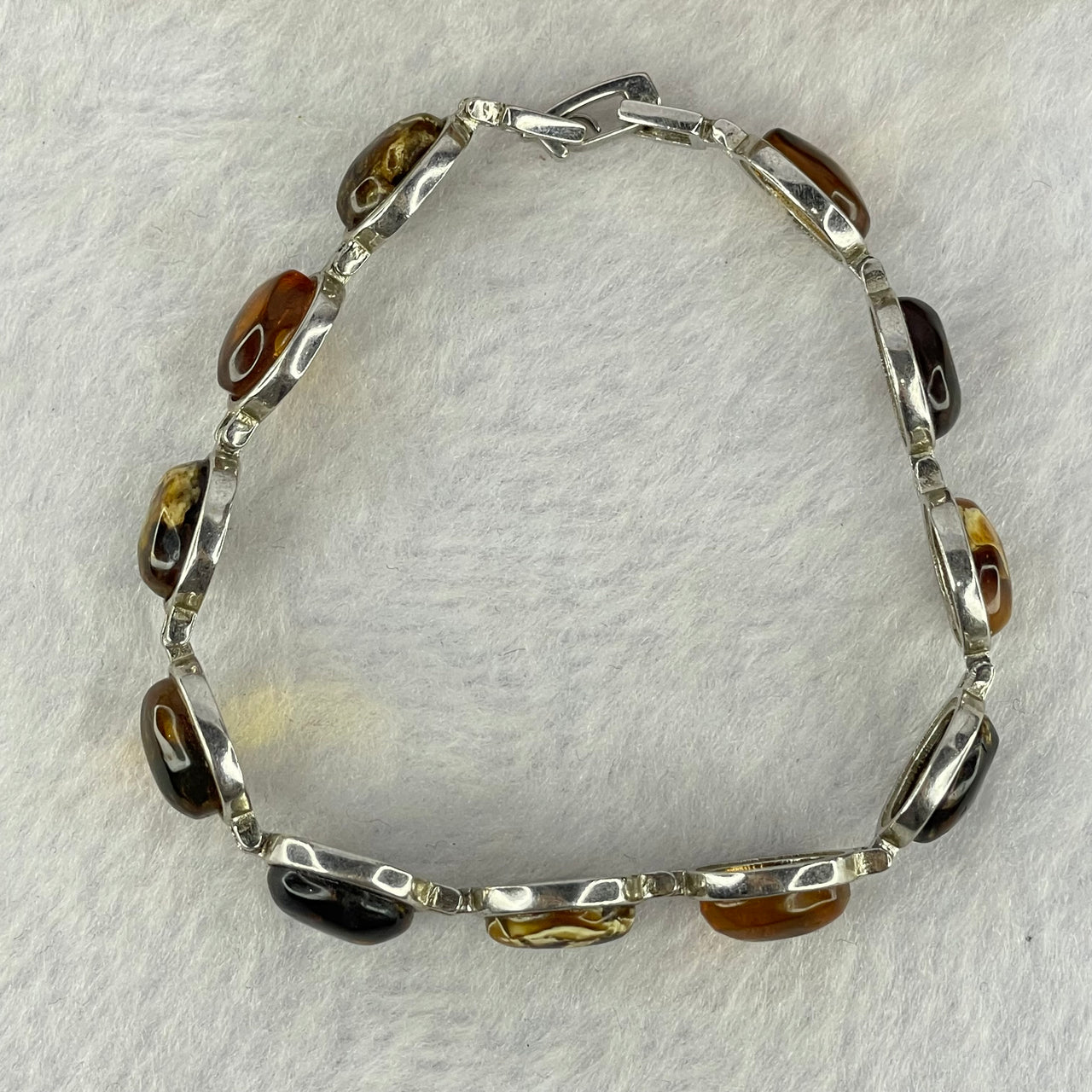 Natural Mixed Color Amber Beads in Sliver Bracelet 天然抚顺多宝手链 11.11g 16.5cm 10.0 by 7.9 by 4.0mm 11pcs - Huangs Jadeite and Jewelry Pte Ltd