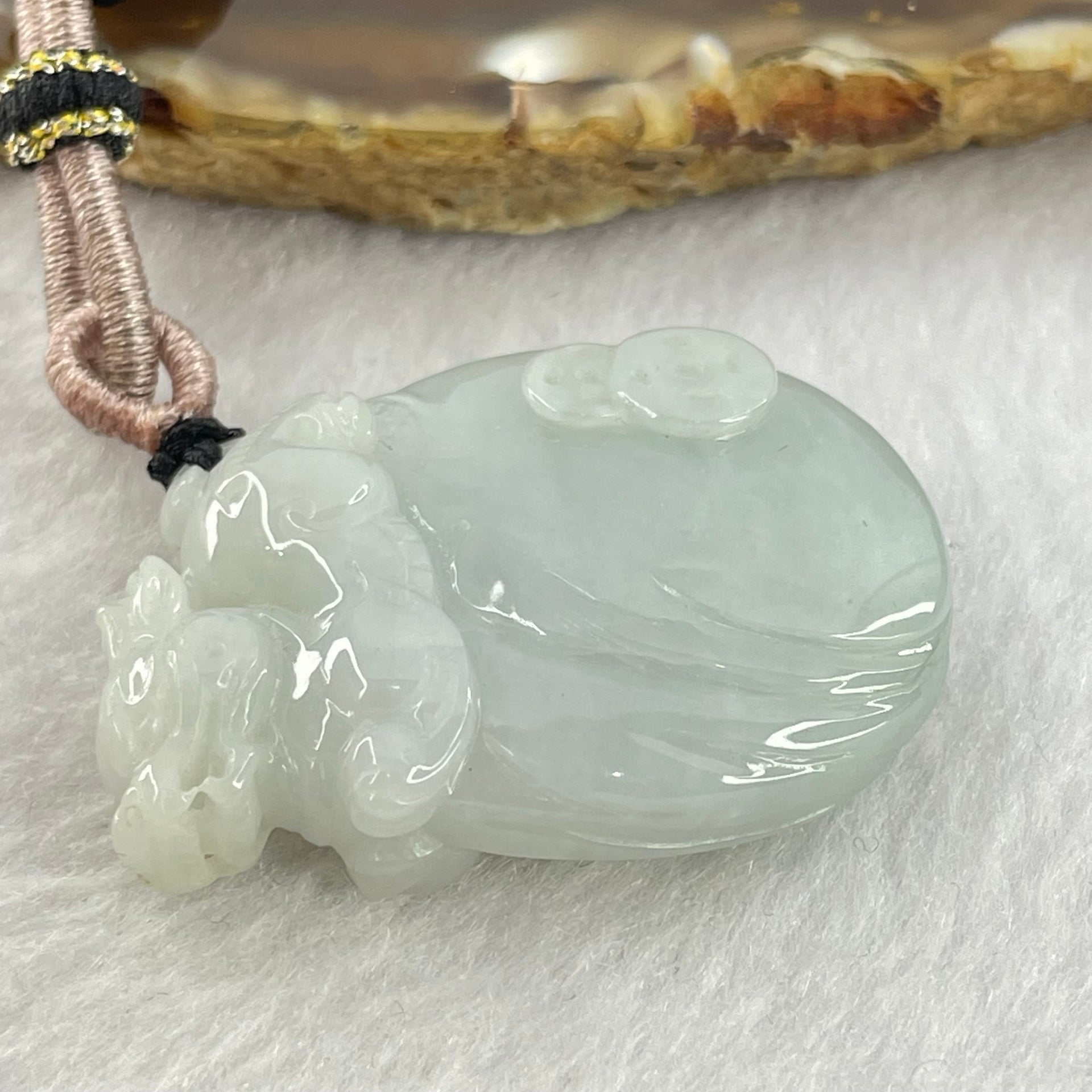 Type A Faint Lavender Green Jadeite Pixiu on Money Bag and Coins Pendent 22.16g 38.1 by 27.4 by 10.3mm - Huangs Jadeite and Jewelry Pte Ltd