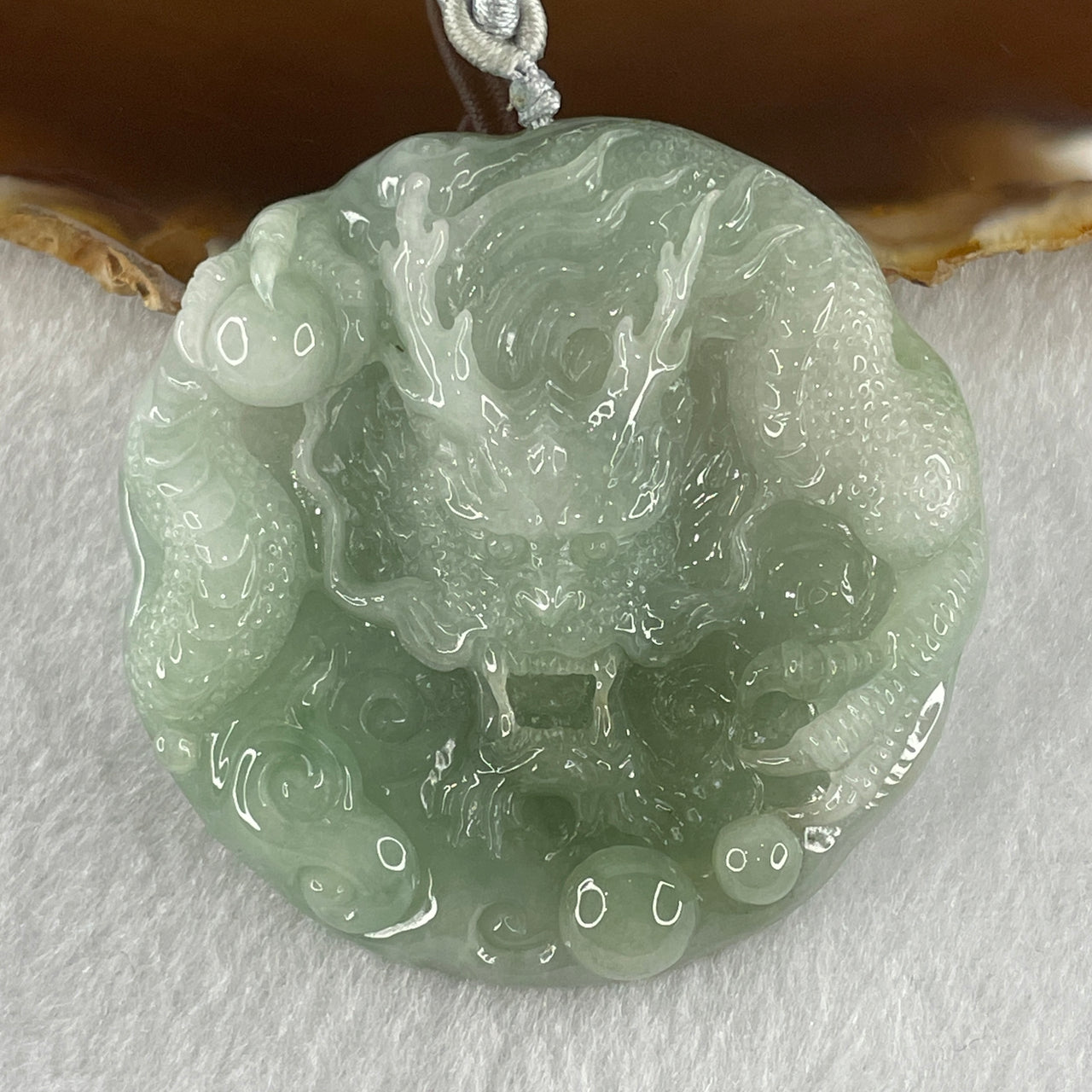 Type A Light Green with White Piao Hua Jadeite Dragon Double Side Pendant 62.04g 55.5 by 11.2mm