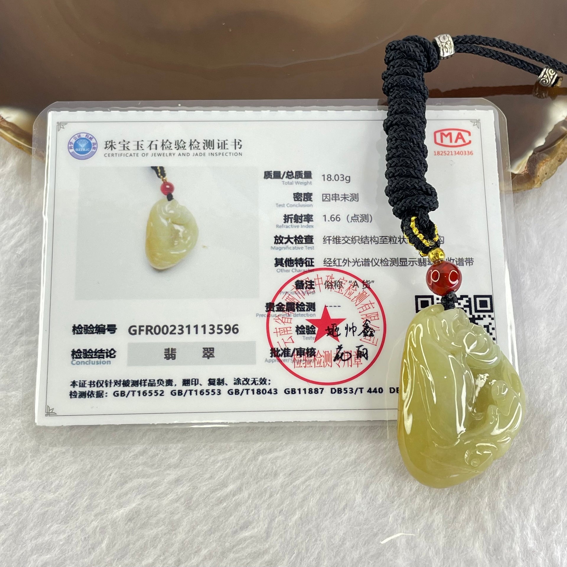 Type A Yellow with Green Jadeite Flower and Gui Ren Benefactor Pendant 18.03g 31.9 by 22.7 by 13.8mm - Huangs Jadeite and Jewelry Pte Ltd