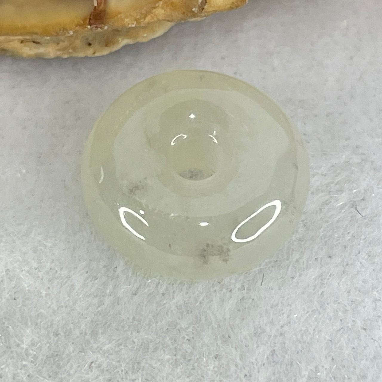 Type A Semi Icy Faint Green Jadeite Ping An Kou Charm/Pendant 2.05g 13.0 by 5.9mm - Huangs Jadeite and Jewelry Pte Ltd