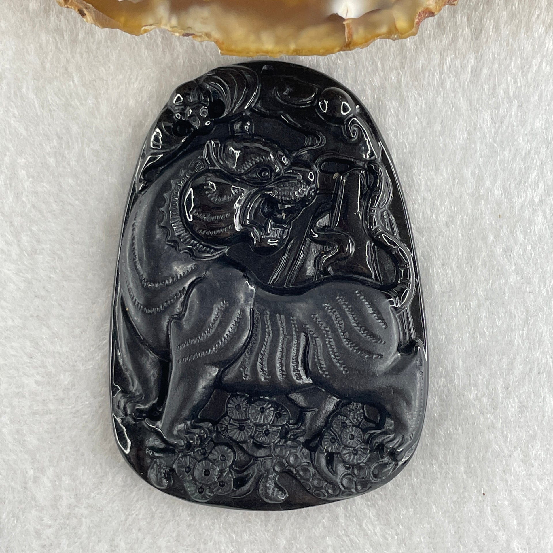 Type A Opaque to Partial Translucent Black Omphacite Jadeite Tiger Pendant 24.24g 56.8 by 40.5 by 7.5mm - Huangs Jadeite and Jewelry Pte Ltd