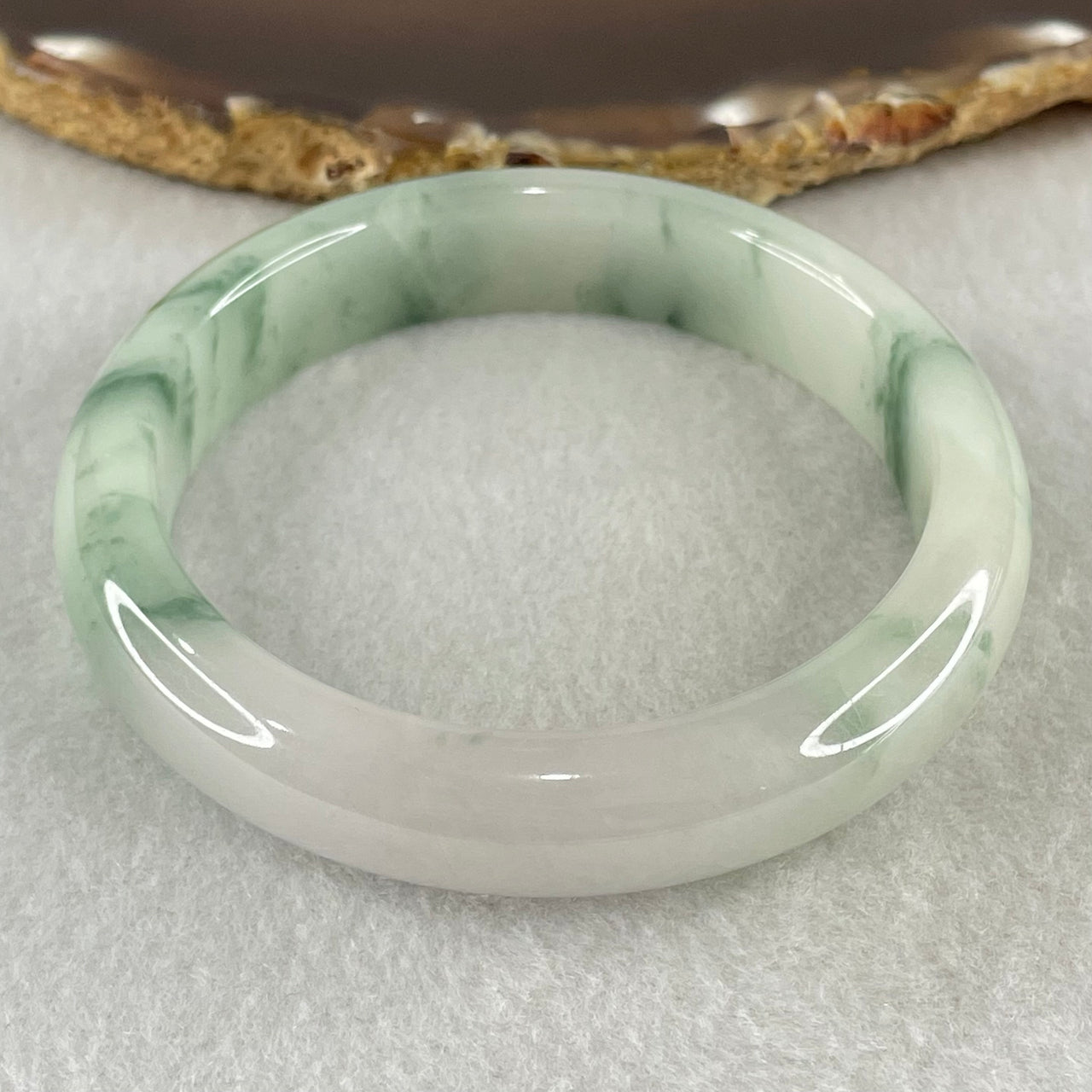 Type A Jelly Light Green with Blueish Green Piao Hua Floral Jadeite Bangle 55.51g Inner Diameter 56.3mm 12.6 by 8.4mm (Slight Internal Lines) - Huangs Jadeite and Jewelry Pte Ltd