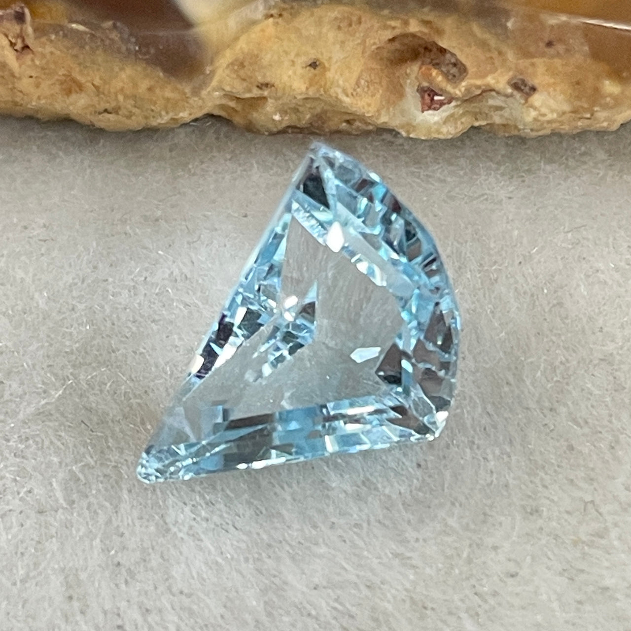 Natural Sky Blue Topaz Trillion Shape 6.20ct 13.6 by 10.8 by 6.8mm - Huangs Jadeite and Jewelry Pte Ltd