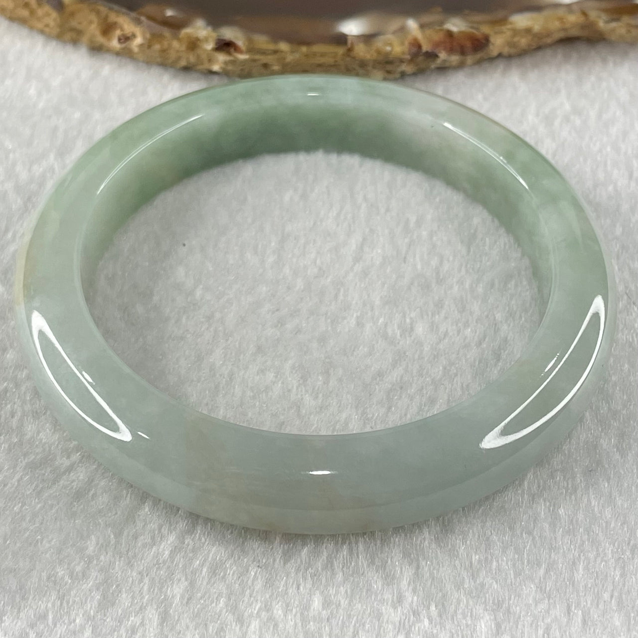 Type A Green Jadeite Bangle 54.02g Internal Diameter 58.2mm 11.0 by 8.6mm (External Lines) - Huangs Jadeite and Jewelry Pte Ltd