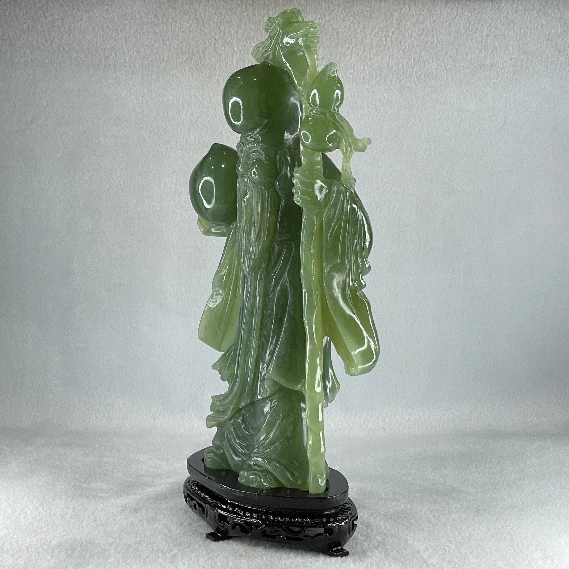 Natural Dark Green Serpentine Shou Xing Gong with Longevity Peach with Wooden Stand Display 1,383.8g 167.0 by 265.0 by 62.0mm - Huangs Jadeite and Jewelry Pte Ltd