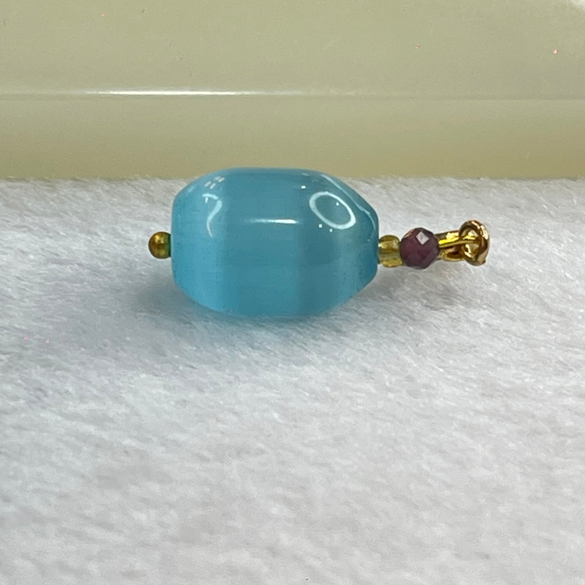 Blue Cat's Eye Glass Charm Pendent 2.31g 13.7 by 9.7mm - Huangs Jadeite and Jewelry Pte Ltd