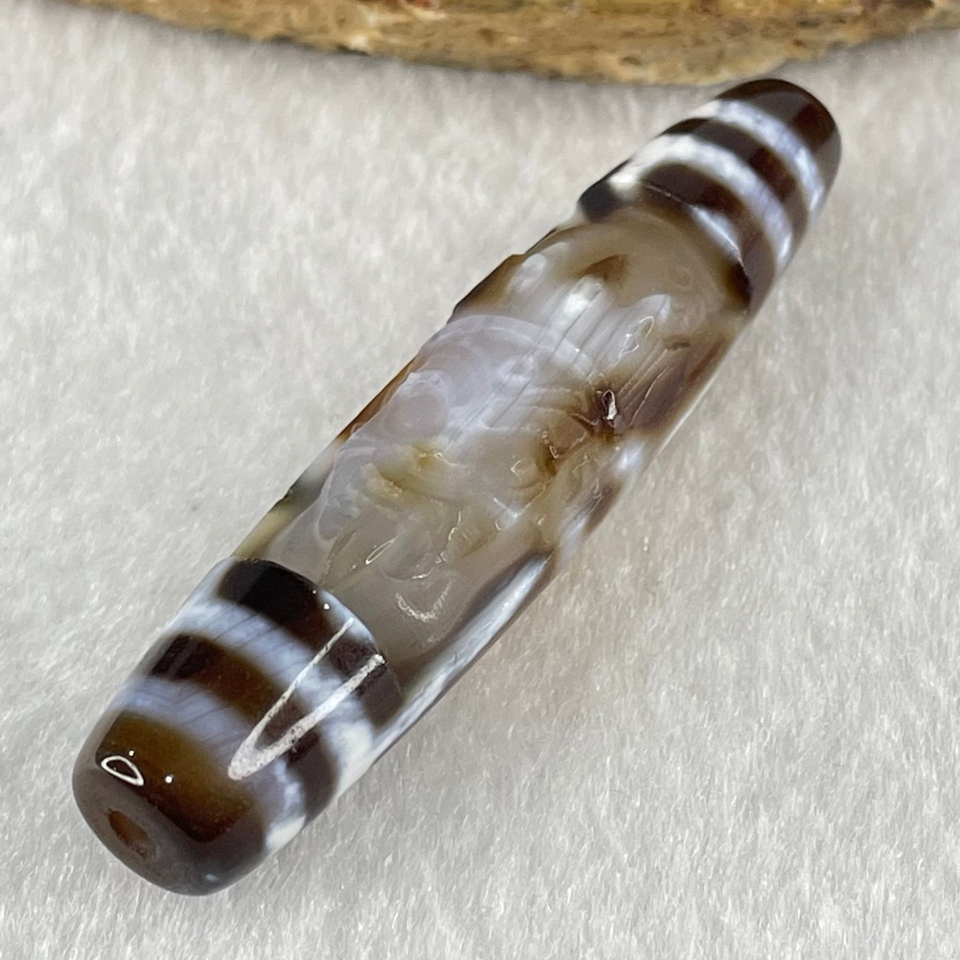 Natural Powerful Tibetan Old Oily Agate Zha Ji La Mu Female Cai Shen Carvings on 9 Eyes Dzi Bead Heavenly Master (Tian Zhu) 九眼扎基拉姆女财神天珠 14.46g 58.4 by 13.0mm - Huangs Jadeite and Jewelry Pte Ltd