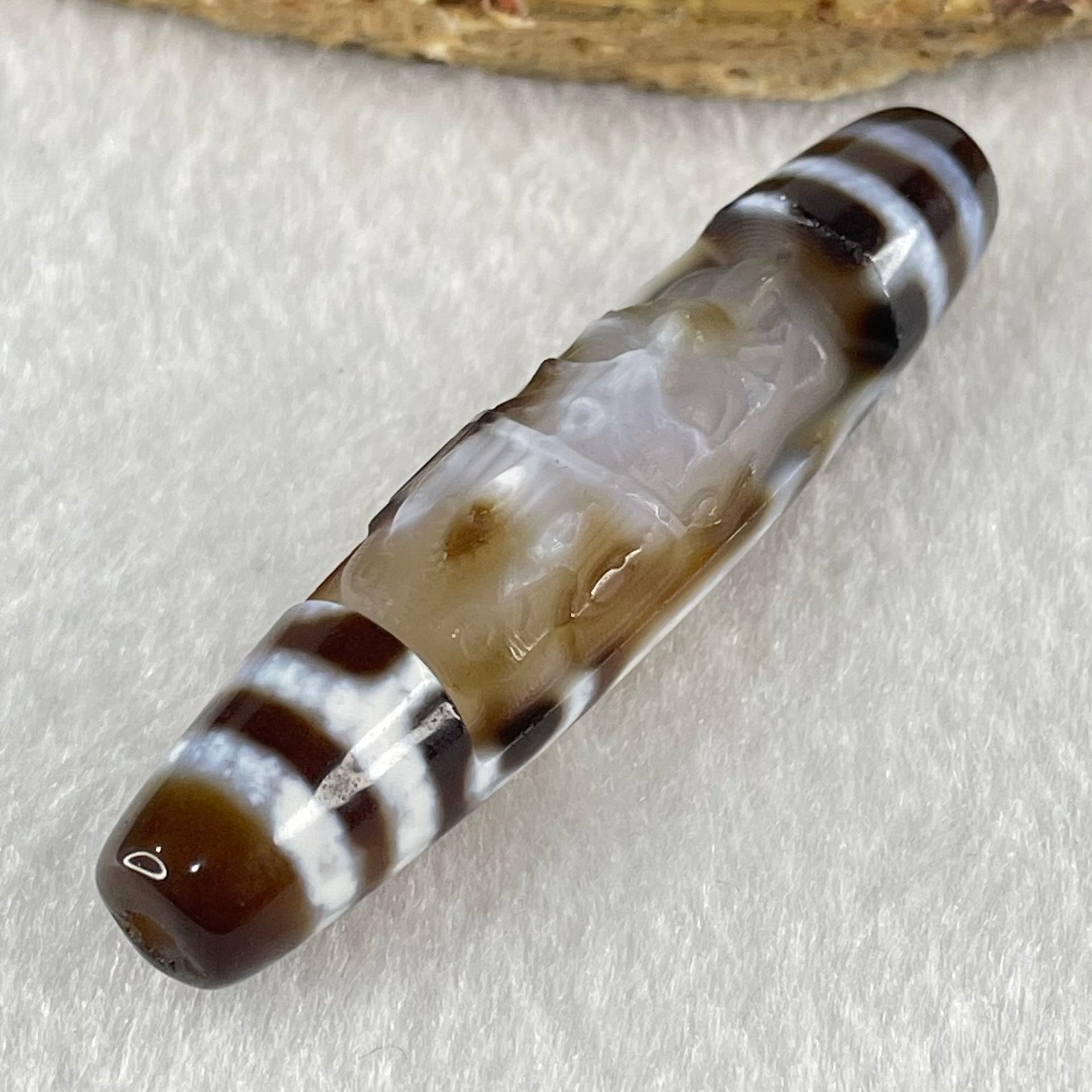 Natural Powerful Tibetan Old Oily Agate Zha Ji La Mu Female Cai Shen Carvings on 9 Eyes Dzi Bead Heavenly Master (Tian Zhu) 九眼扎基拉姆女财神天珠 14.46g 58.4 by 13.0mm - Huangs Jadeite and Jewelry Pte Ltd