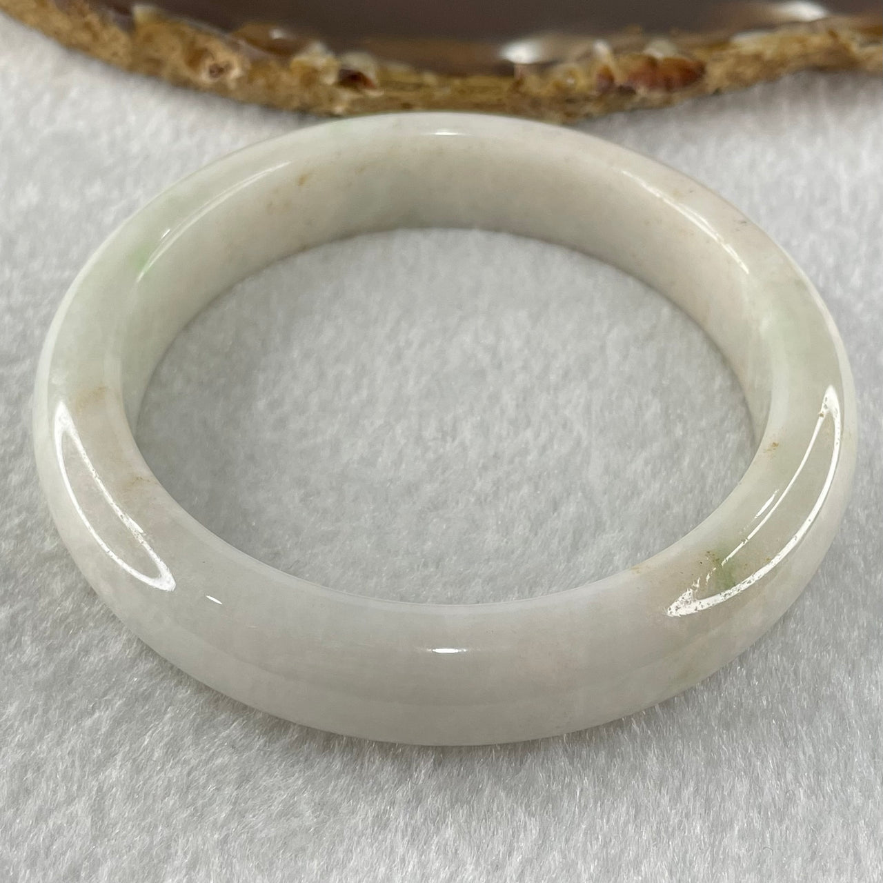 Type A Faint Lavender Green to White Jadeite Bangle 61.55g Internal Diameter 58.3mm 13.0 by 8.5mm (Slight External Roughs and Internal Lines) - Huangs Jadeite and Jewelry Pte Ltd