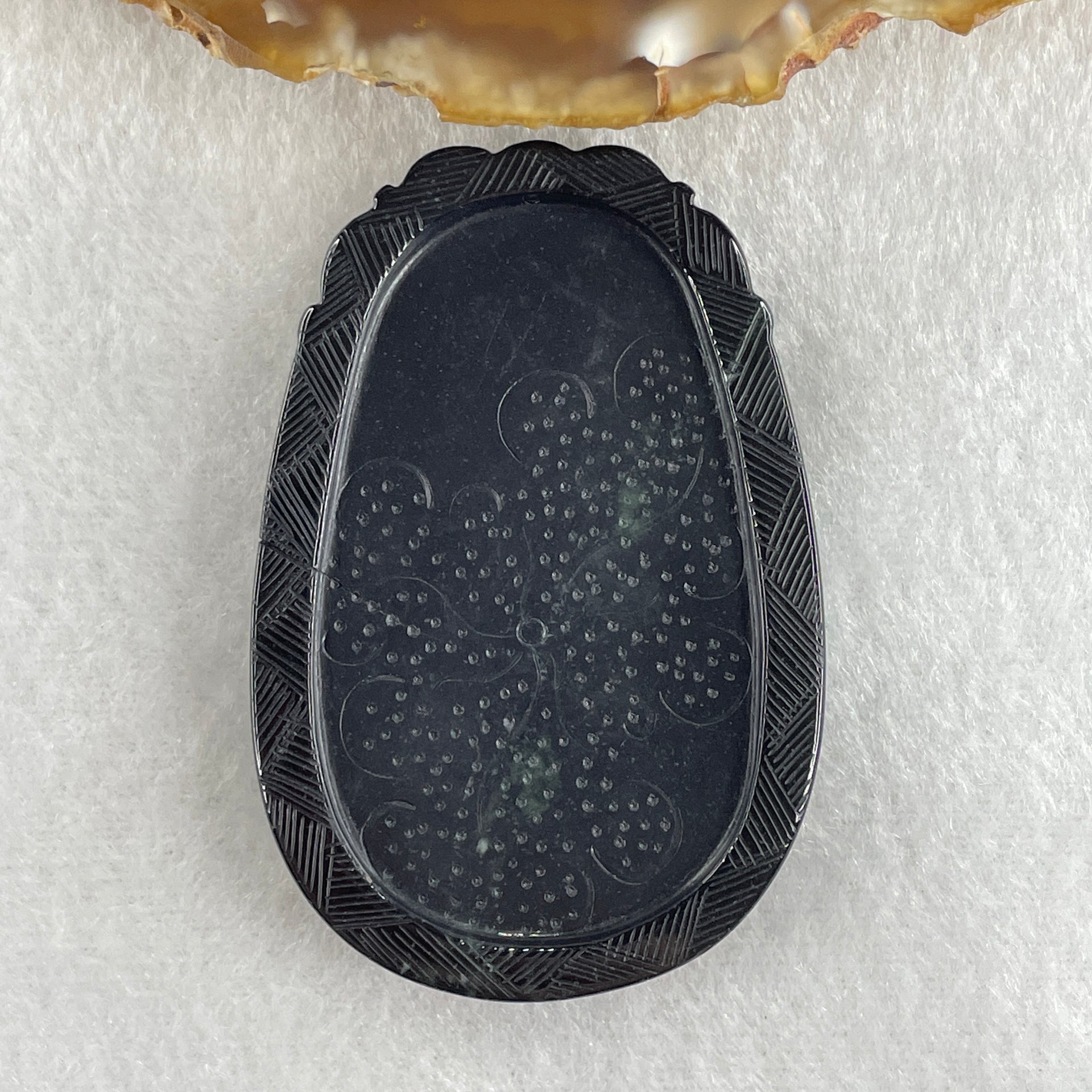 Type A Opaque to Partial Translucent Black Omphacite Jadeite Snake Pendant 24.70g 59.7 by 40.1 by 8.5mm - Huangs Jadeite and Jewelry Pte Ltd