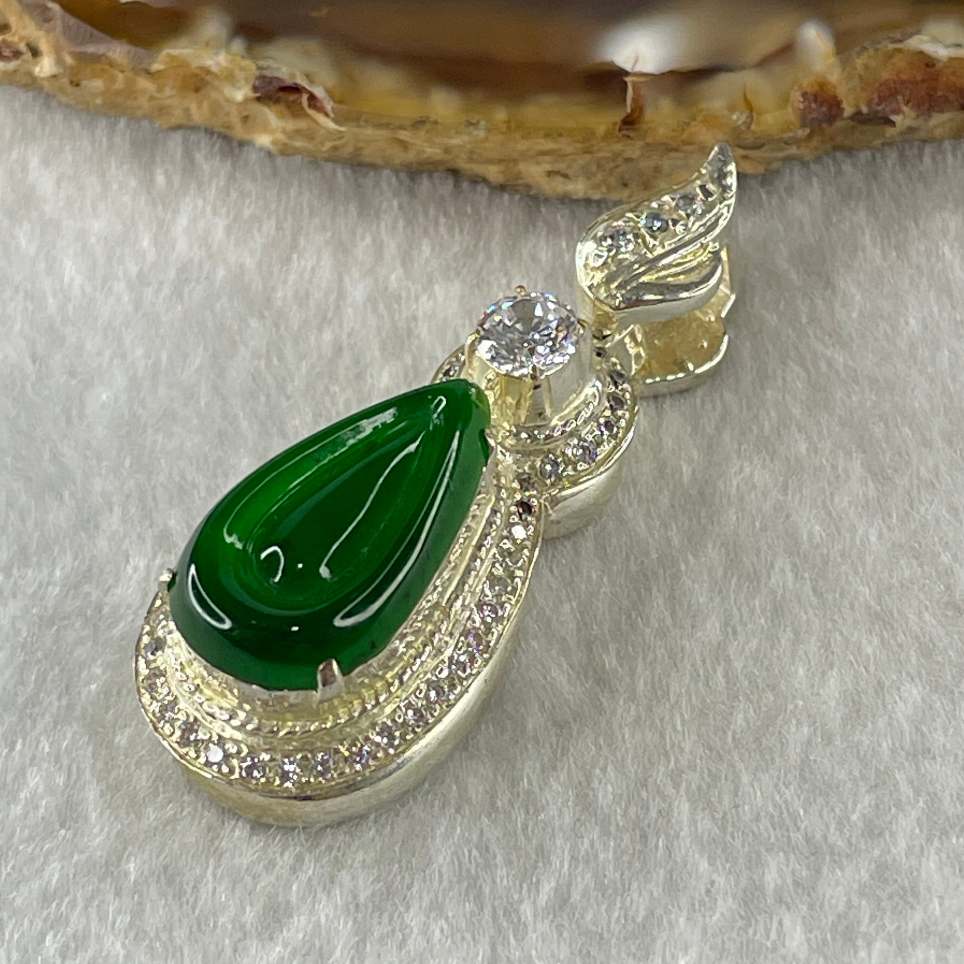 Type A Natural Semi Icy Bright Green Jadeite Tear Drop Shape Stone for Setting 18.1 by 10.5 by 3.0mm (On Silver Pendant Mold) 15.22g - Huangs Jadeite and Jewelry Pte Ltd