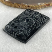 Type A Opaque to Partial Translucent Black Omphacite Jadeite Dragon with pixiu Pendant 45.42g 66.0 by 45.5 by 9.2mm - Huangs Jadeite and Jewelry Pte Ltd