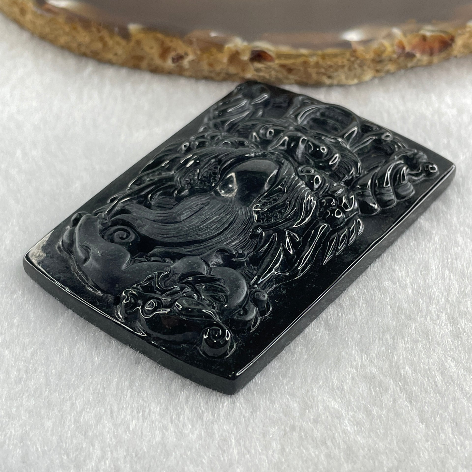 Type A Opaque to Partial Translucent Black Omphacite Jadeite Dragon with pixiu Pendant 45.42g 66.0 by 45.5 by 9.2mm - Huangs Jadeite and Jewelry Pte Ltd