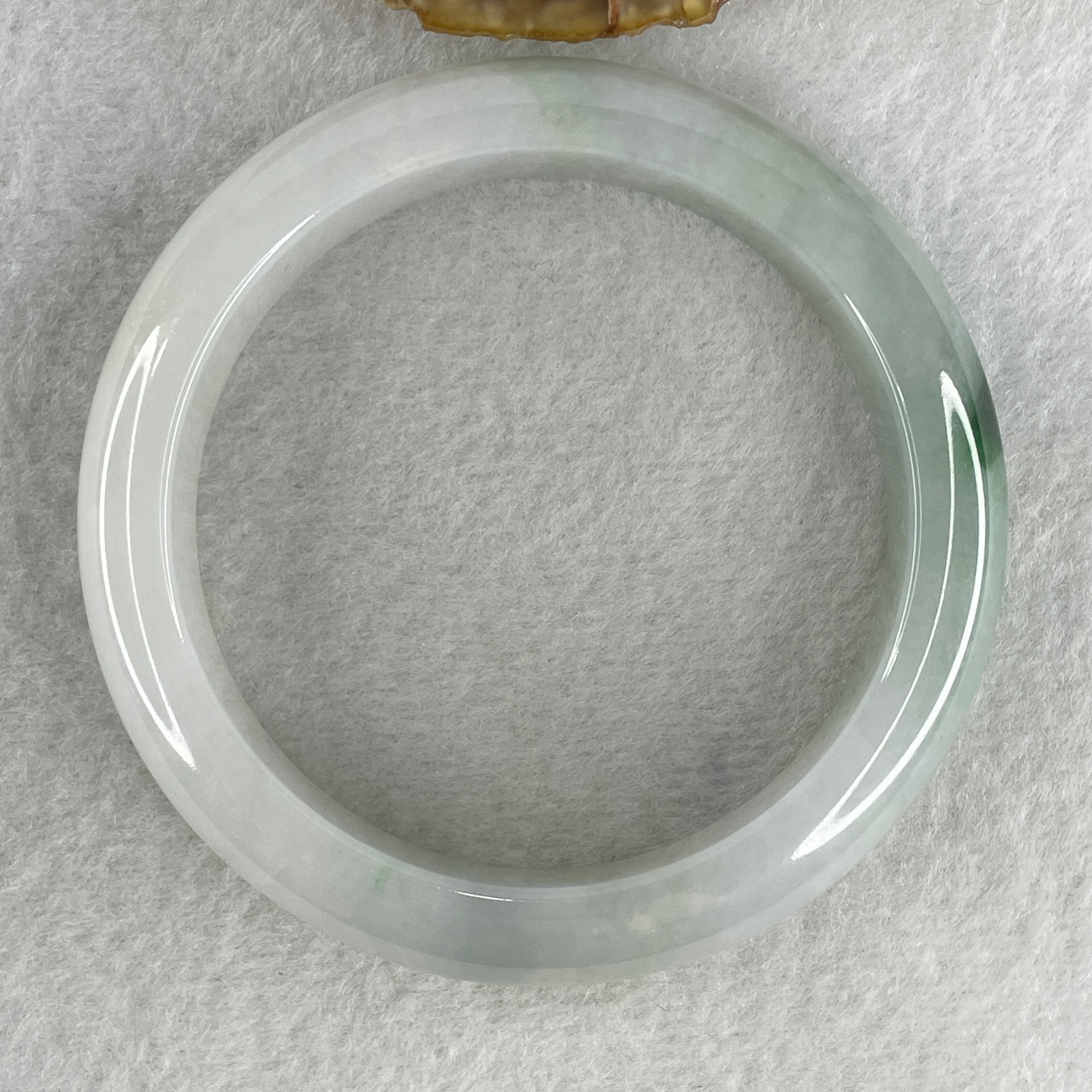 Type A Natural Jelly Light Green with Faint Lavender with Spicy Green Spot Jadeite Bangle 70.15g Inner Diameter 57.8mm 14.3 by 9.6mm (Close to Perfect) - Huangs Jadeite and Jewelry Pte Ltd