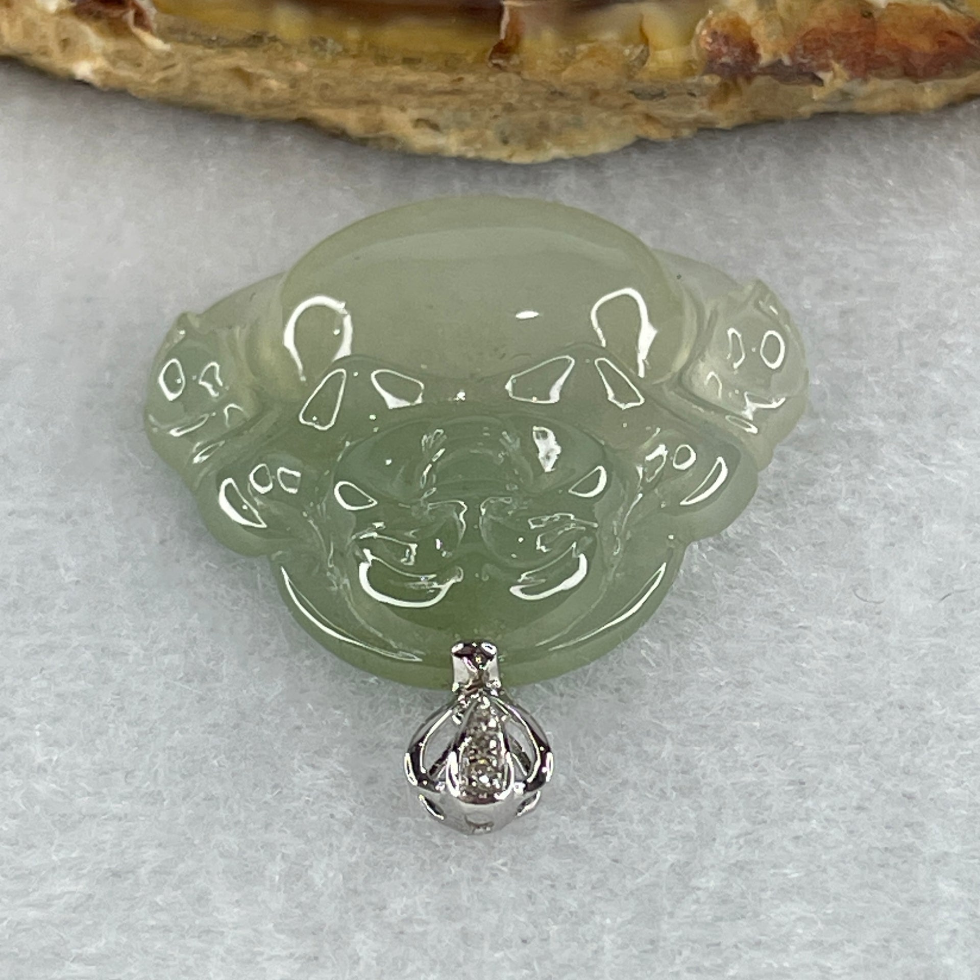 18K 750 White Gold Type A Icy Light Green Jadeite Milo Buddha with Diamonds Pendant 6.71g 26.6 by 28.0 by 6.0mm - Huangs Jadeite and Jewelry Pte Ltd