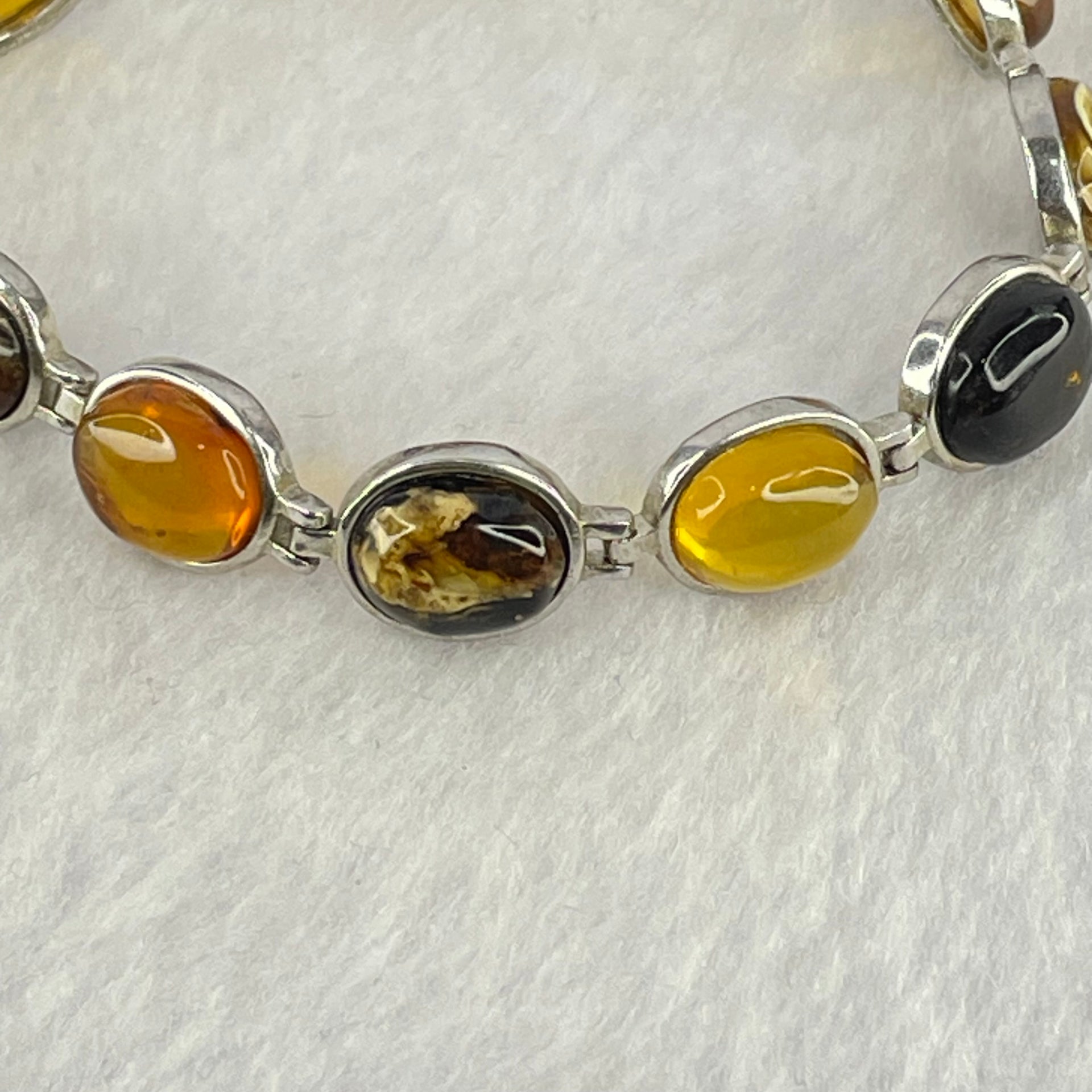 Natural Mixed Color Amber Beads in Sliver Bracelet 天然抚顺多宝手链 11.11g 16.5cm 10.0 by 7.9 by 4.0mm 11pcs - Huangs Jadeite and Jewelry Pte Ltd