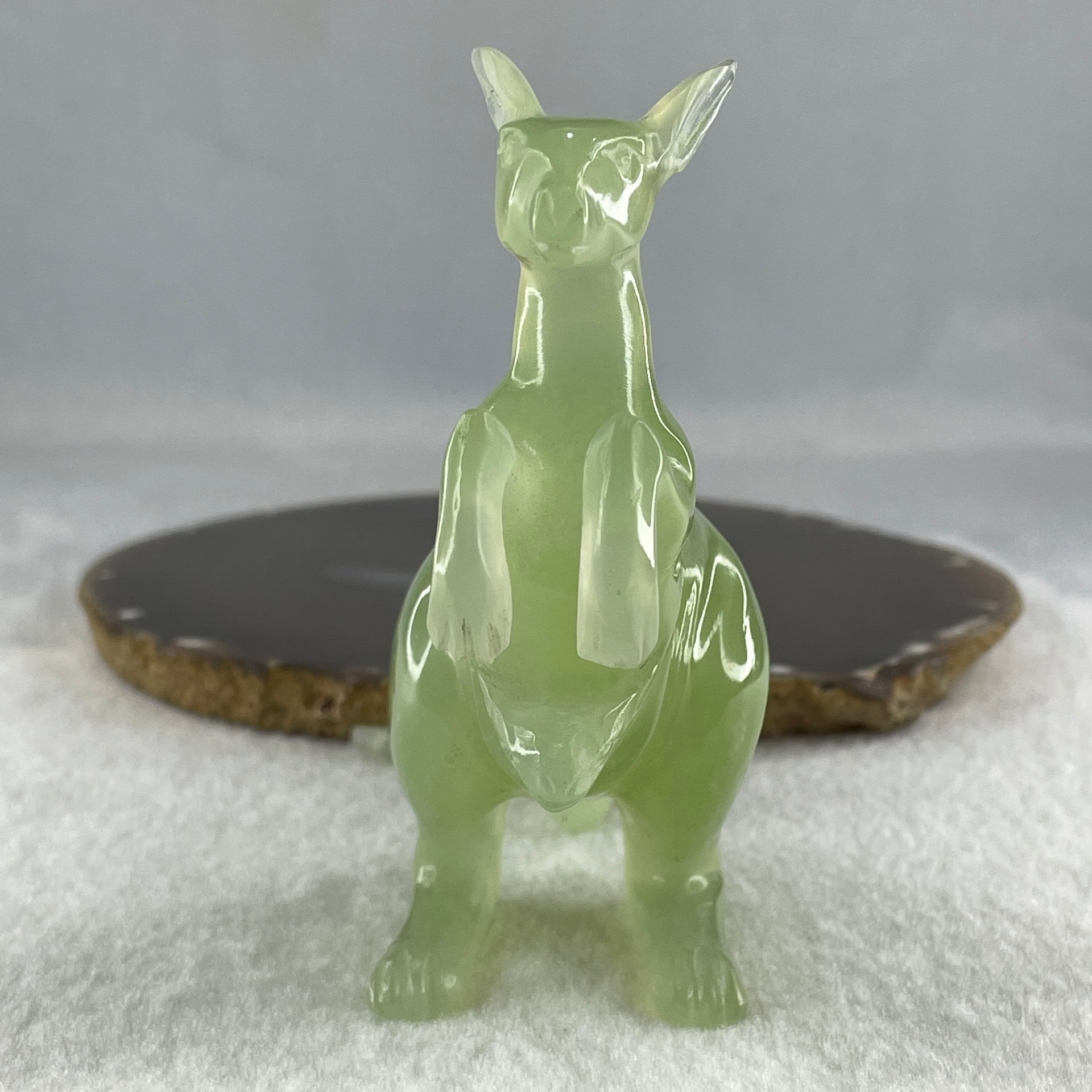 Natural Green Serpentine Kangaroo with Baby with Wooden Stand Display 235.6g 125.0 by 63.8 by 116.5mm - Huangs Jadeite and Jewelry Pte Ltd
